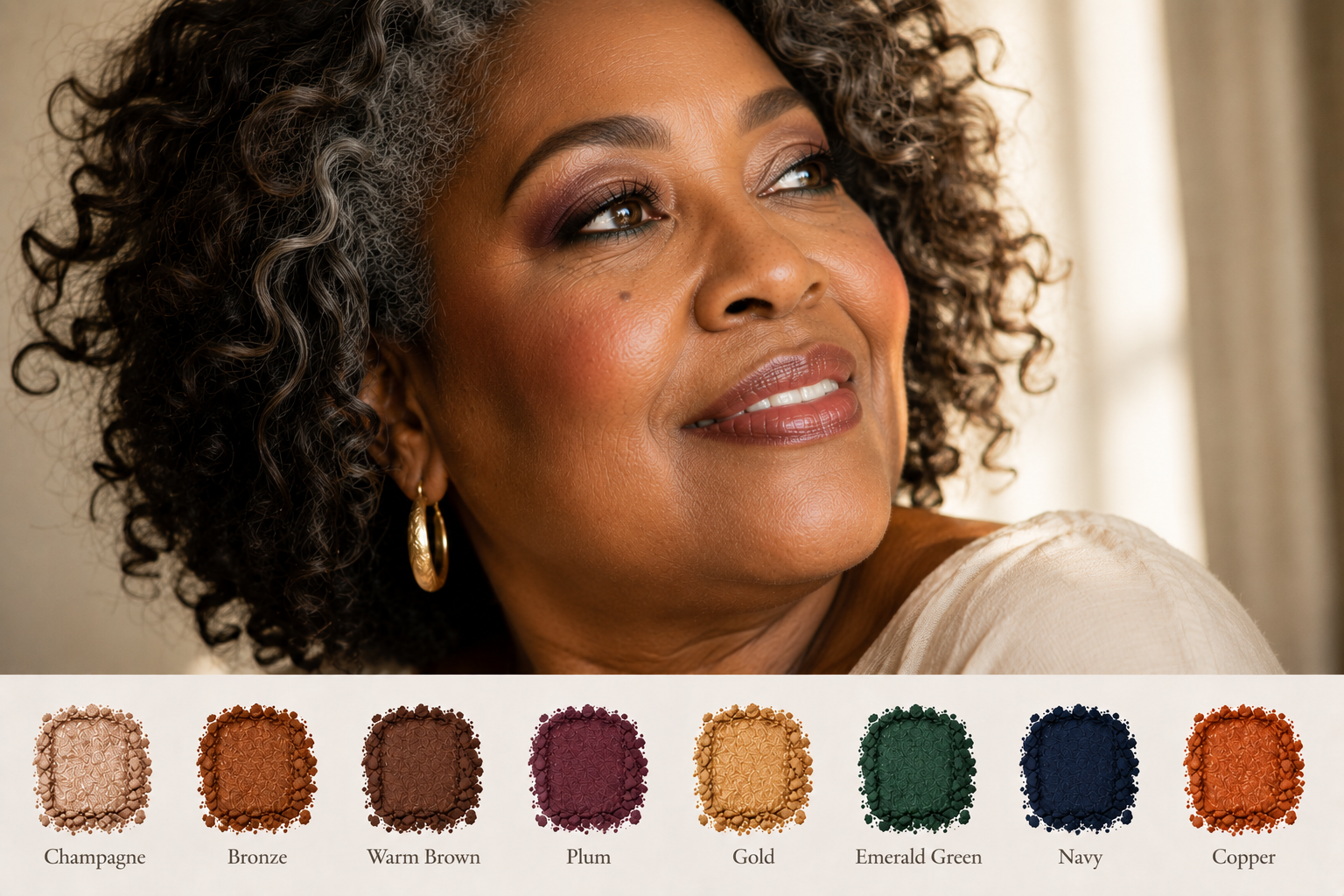 Luxury editorial close-up of a mature Black woman showing flattering eyeshadow colors for brown eyes, featuring champagne, bronze, plum, emerald, and warm brown tones that brighten mature eyes.