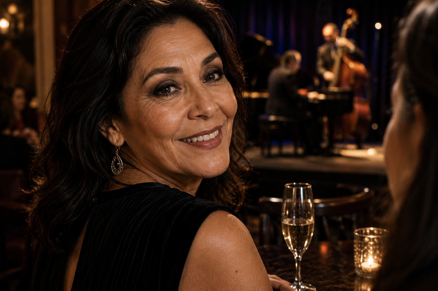 Soft smoky eye makeup for women over 50 uses diffused cocoa and charcoal-brown shadow to add flattering depth to mature eyes without harsh lines or heavy black makeup. Perfect inspiration for an elegant evening look.