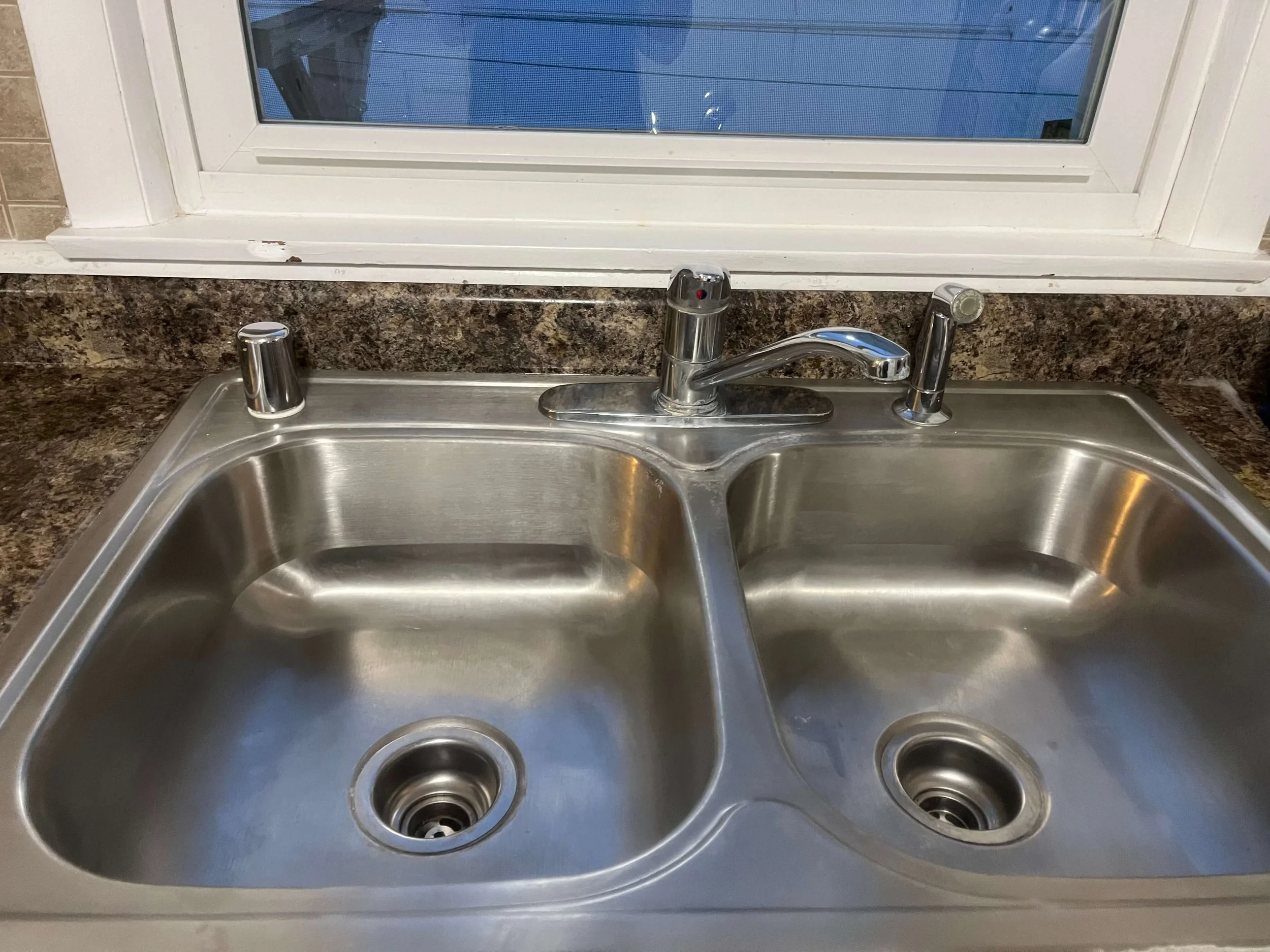 Kitchen sink after professional house cleaning by Midwest Cleaning LLC