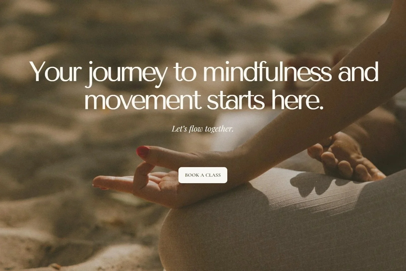 A call to action section that says "Your journey to mindfulness and movement starts here" overlayed on a close up photo of a woman's hands and legs during a meditation on the beach.