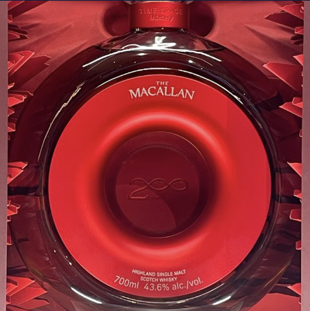 Close-up of a bottle of The Macallan Highland Single Malt Scotch Whisky Time:Space Mastery