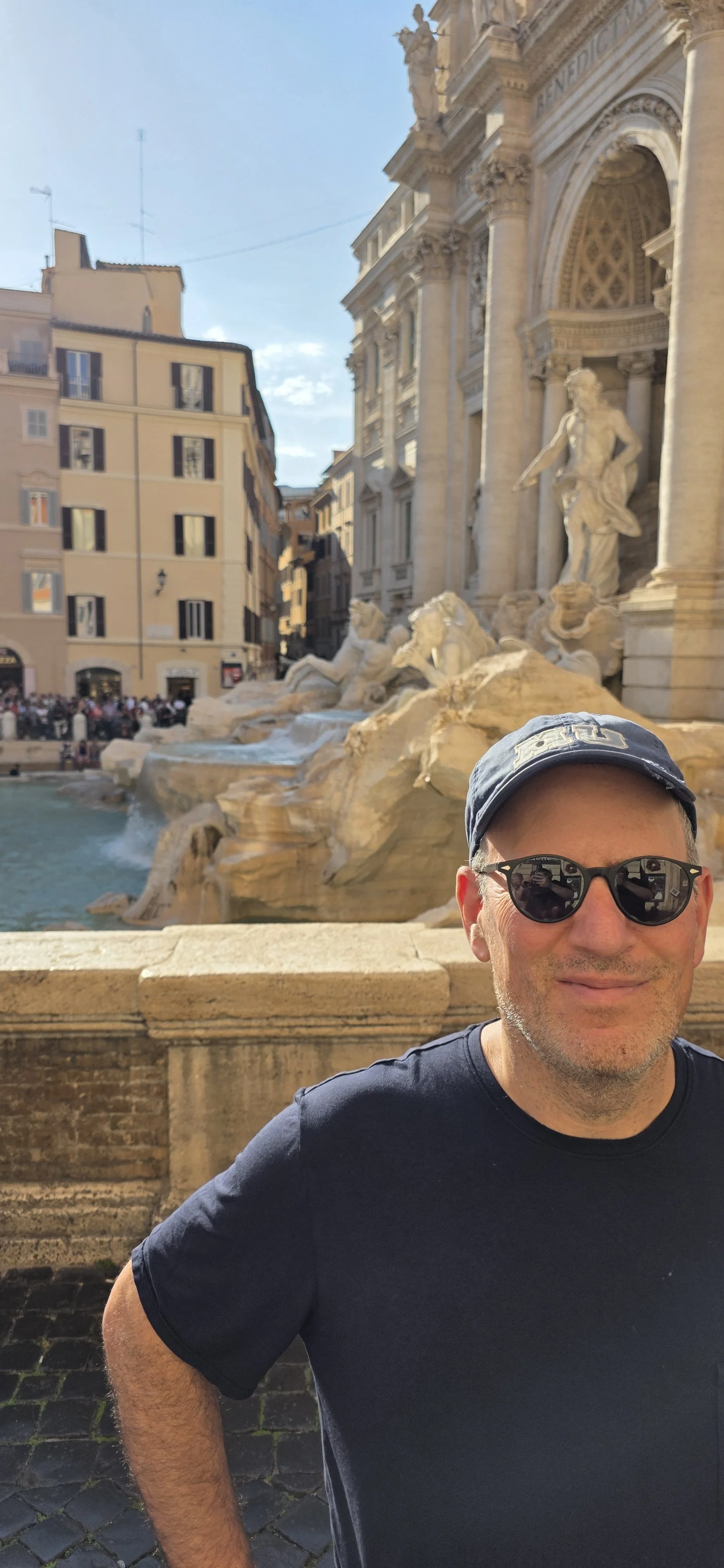 Joshua Brickman in front of the Trevi Fountain