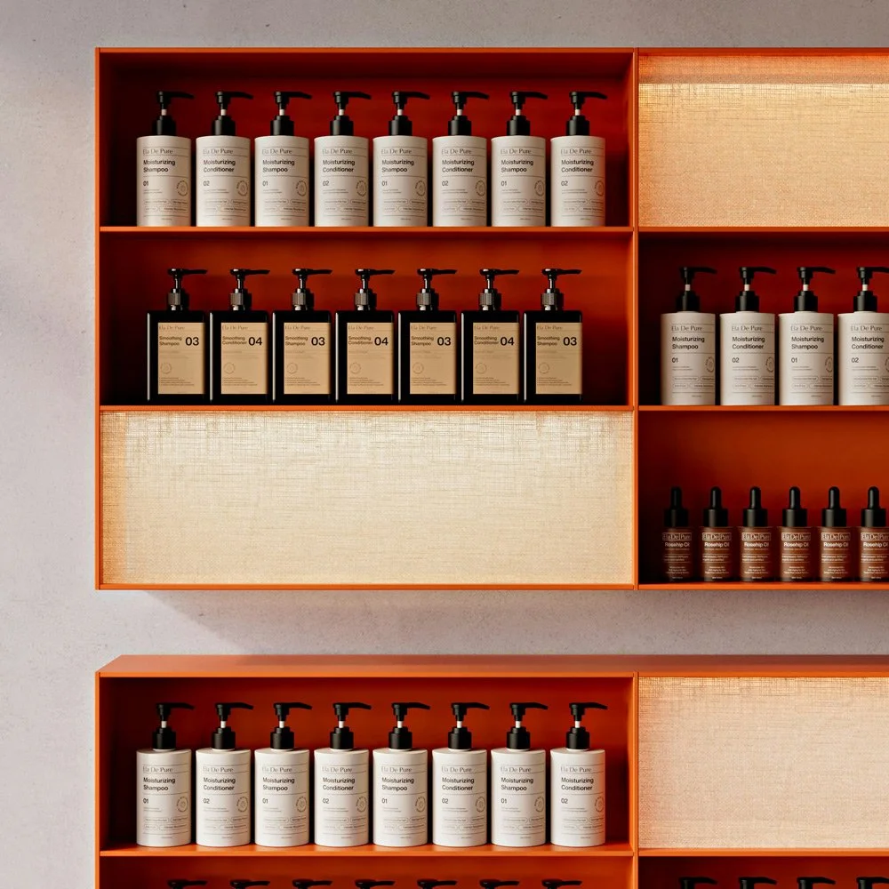Shelf with multiple bottles of shampoo, conditioner, and treatment products arranged in a neatly organized display.