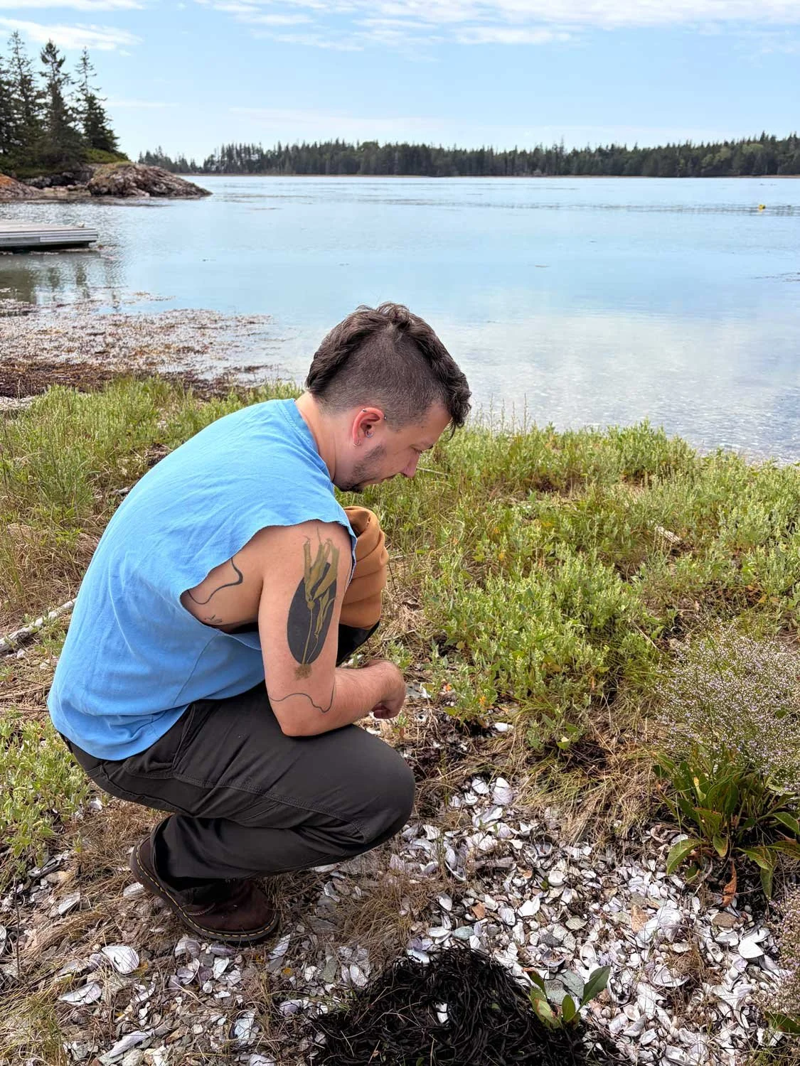 1 crouching-by-lake.jpg