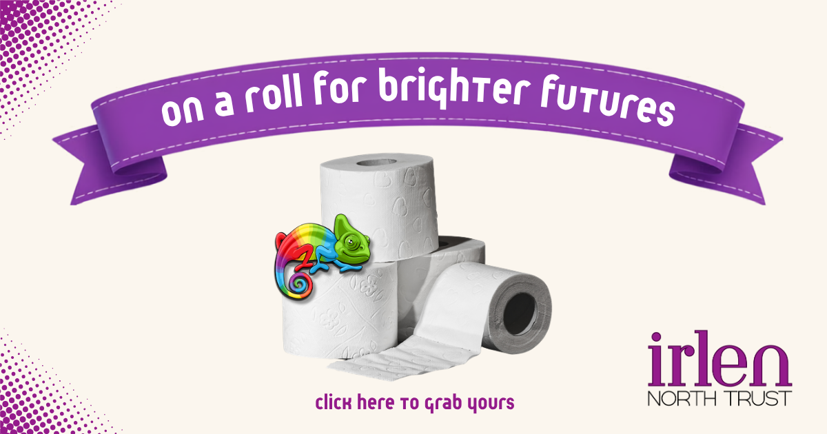 Three rolls of white toilet paper, with one roll partially unrolled, and a colorful cartoon chameleon with rainbow colors and a green head sitting on top of the rolls.