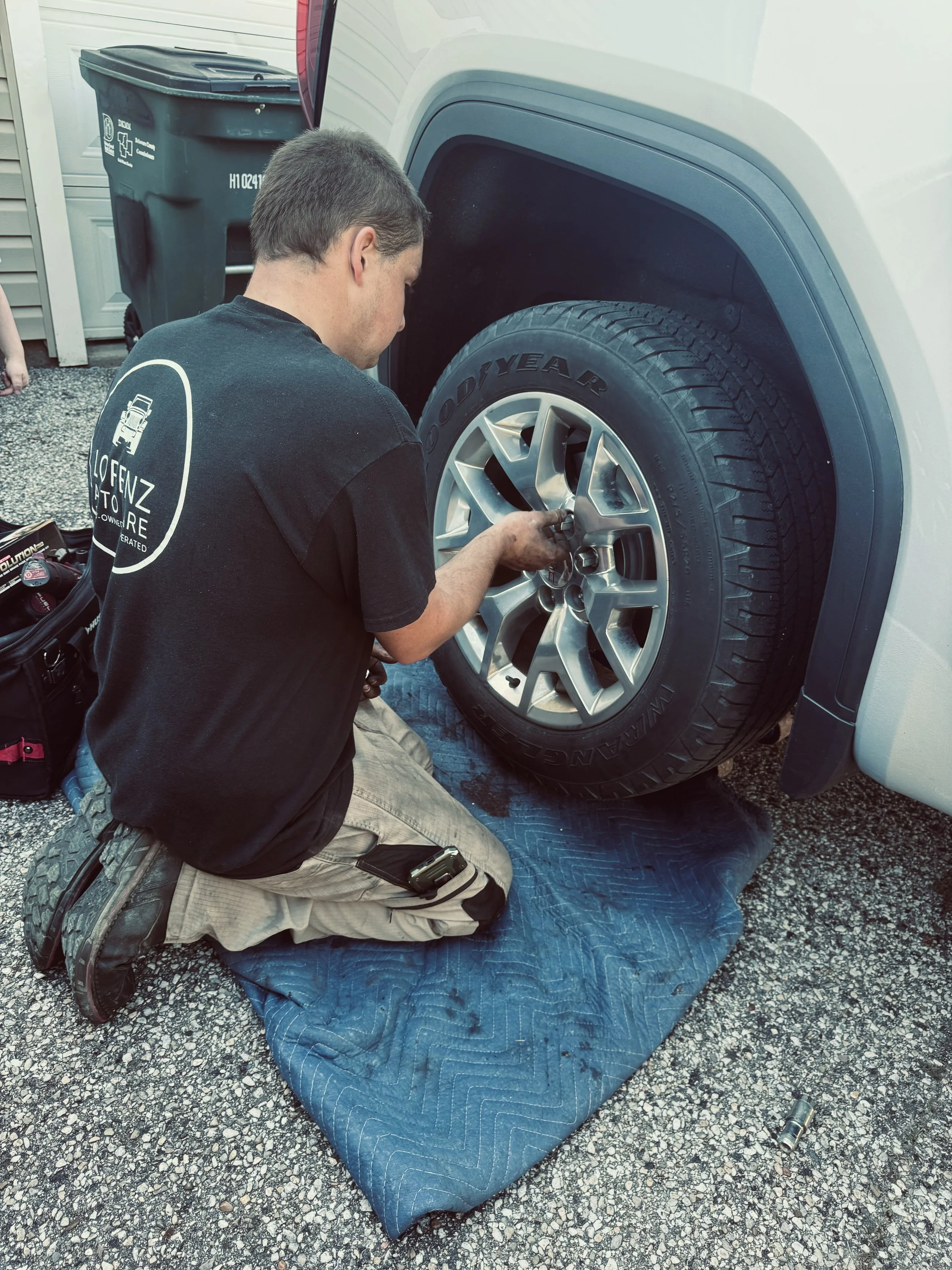 Lorenz Auto Cares mechanic Ben working on a customer's car
