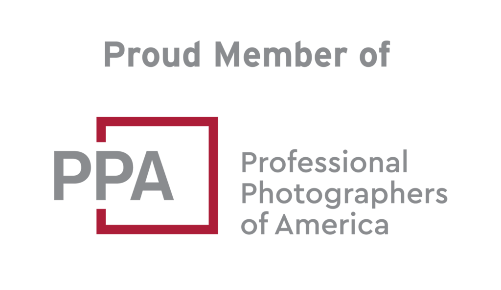 Logo of the Professional Photographers of America featuring the text "Proud Member of PPA" and "Professional Photographers of America" with a black background.