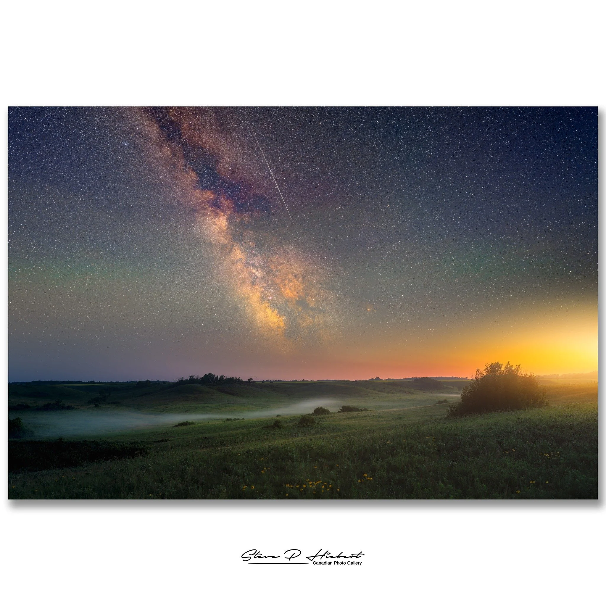 Some scenes can't be captured in a single moment.

This is a composite image created by blending two photographs taken from the exact same location. The valley was photographed just after sunset while the last light revealed the rolling hills and the