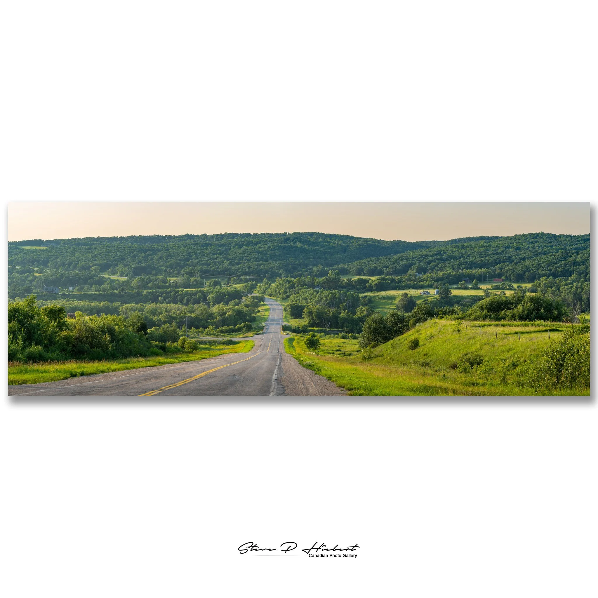 Sometimes the best photographs are the ones you never planned.
I was out yesterday evening photographing the beautiful Pembina Valley, enjoying the warm light and looking for interesting landscapes, when a scary biker pulled up beside me...

Well... 