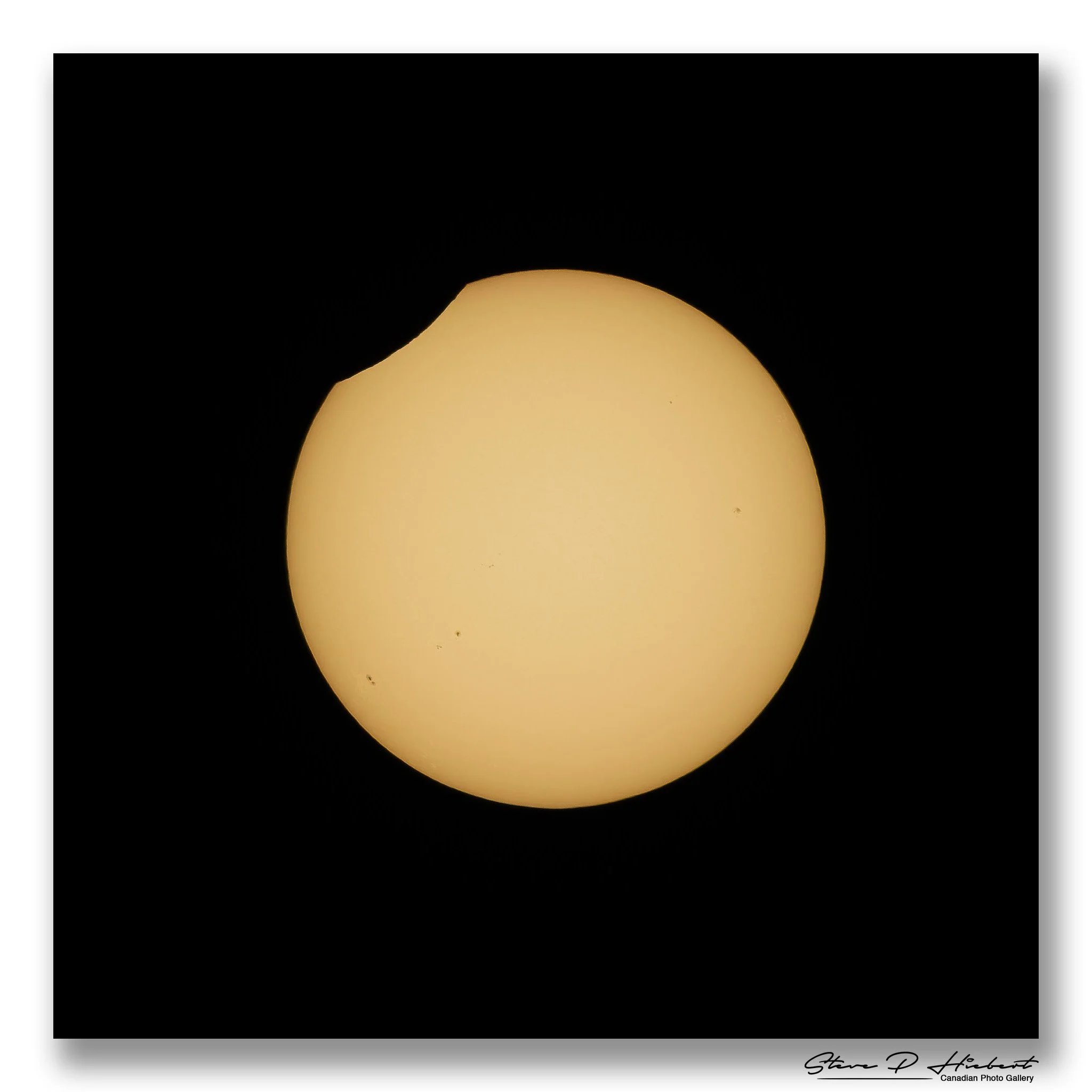 Not a major eclipse, but definitely one worth photographing! ☀️🌑

From Morden, today's partial solar eclipse reached about 3.7% coverage, leaving just a small bite taken out of the Sun. 

Look closely and you'll also spot several sunspots on the Sun