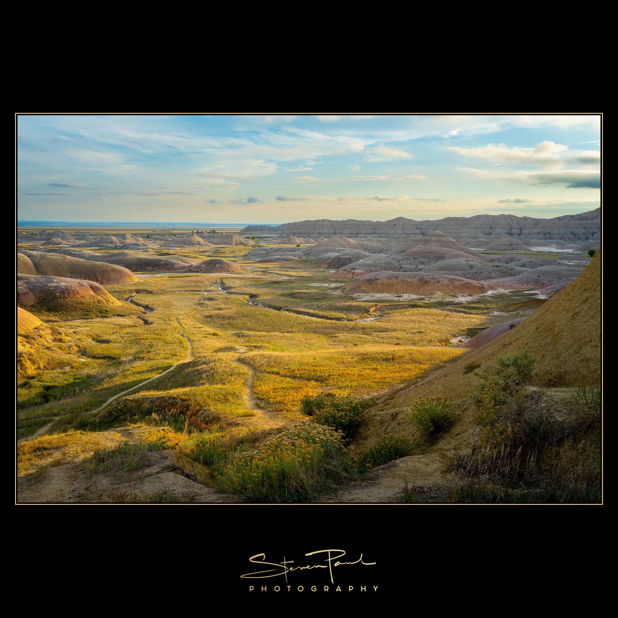 A softer side of the Badlands. 🌾

Warm light on the grasses. Greens and golds beside muted pinks and earthy hills. What drew me to this view was the gentle way those colours came together.

Another reason to slow down and notice the detail in God&rs
