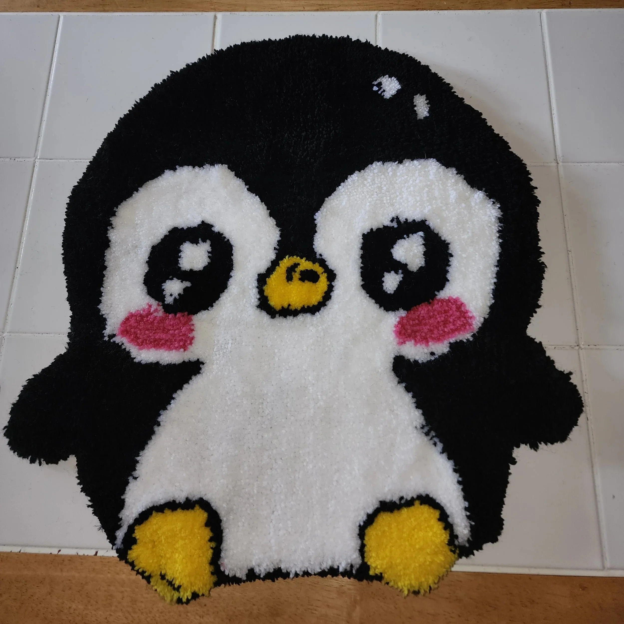Penguin tufted rug