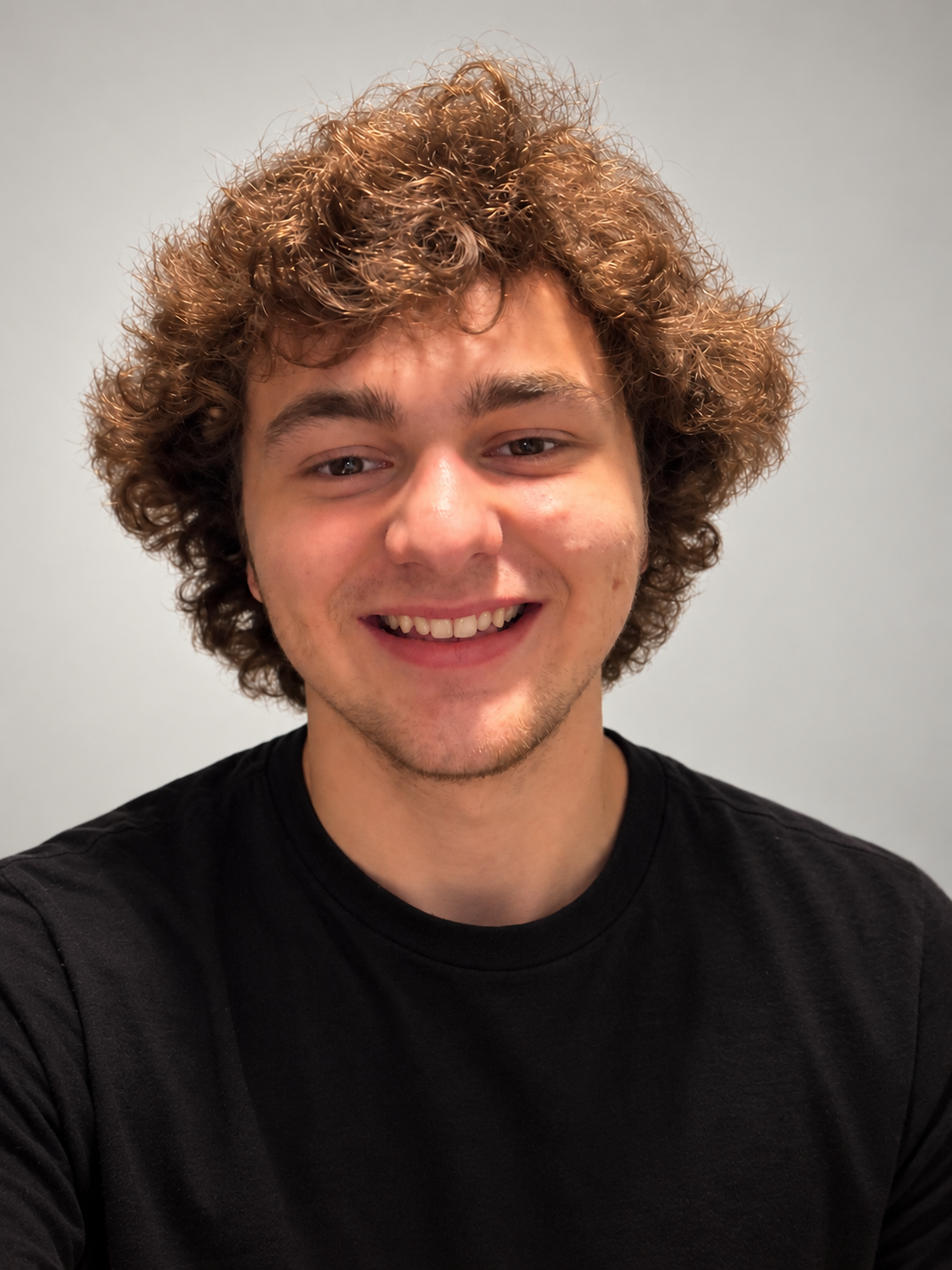Ryan, Furry Friends Fitness dog walker and pet sitter, smiling in a staff photo.