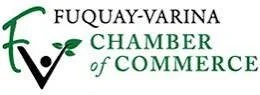 Logo of Fuquay-Varina Chamber of Commerce with green and black text and a stylized check mark with a leaf.