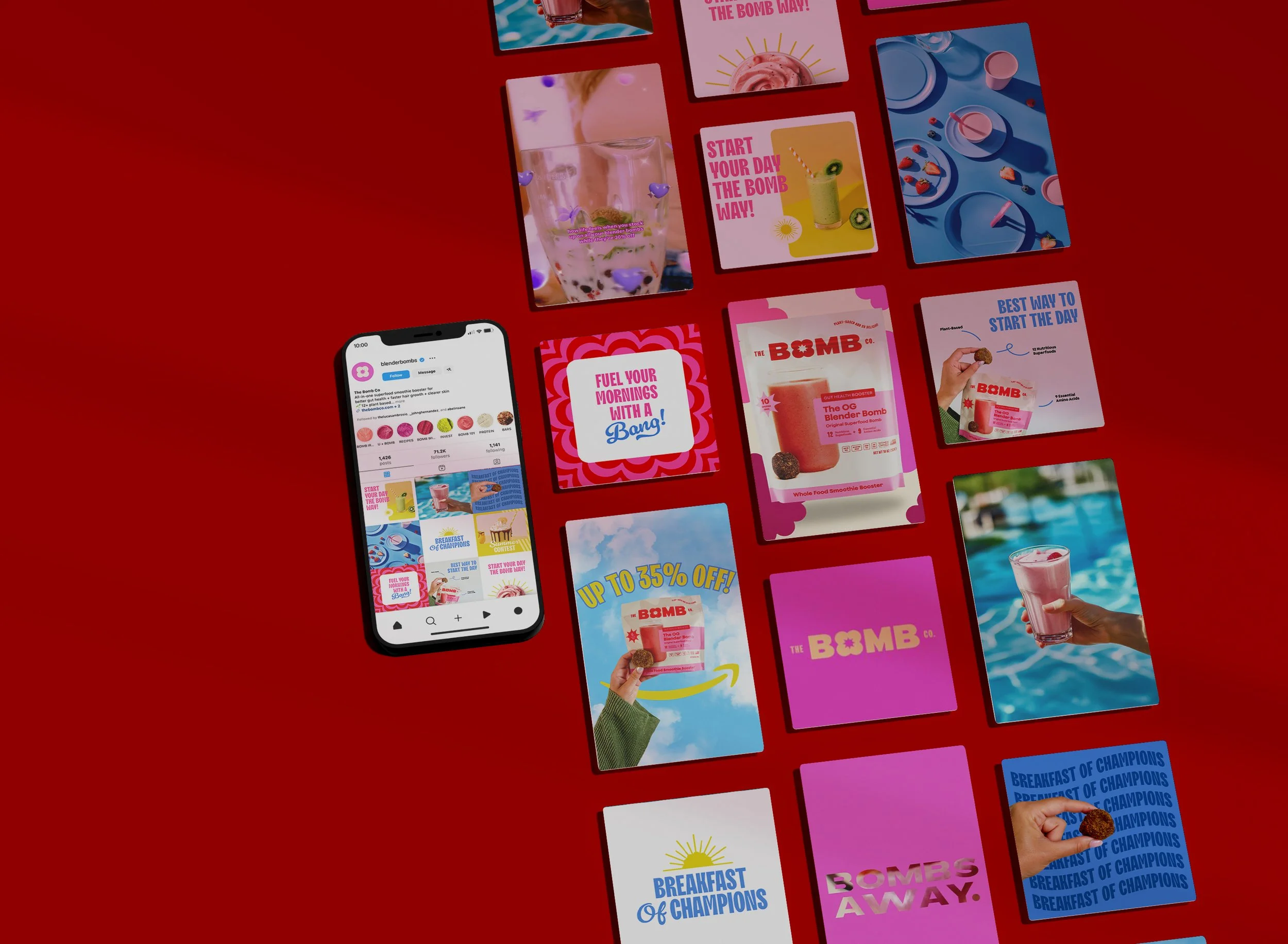 Flat lay of various colorful marketing cards and an Instagram feed on a smartphone, featuring beverage images, promotional messages, and branding for the BOMB Co, against a red background.