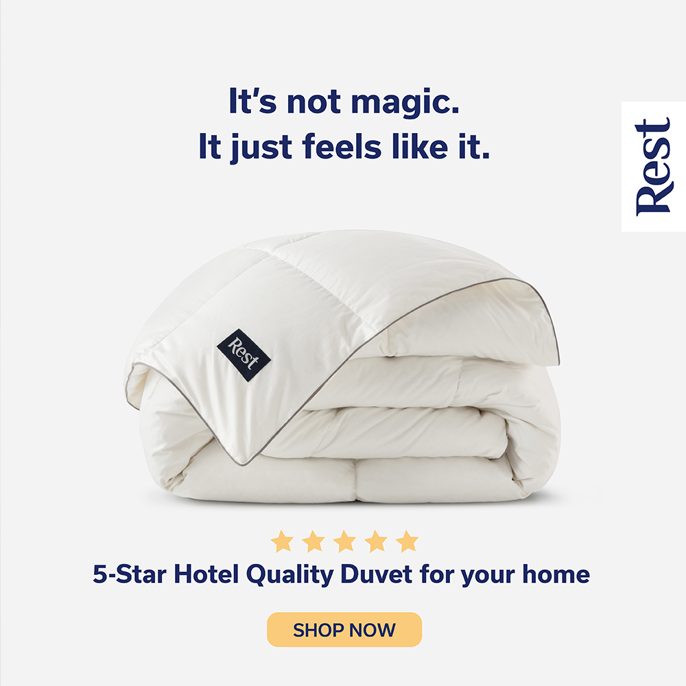 A neatly folded white duvet with a matching pillow labeled 'Rest' displayed against a white background. Text on the image promotes a 5-star hotel quality duvet for home use, with a call-to-action button to shop now.