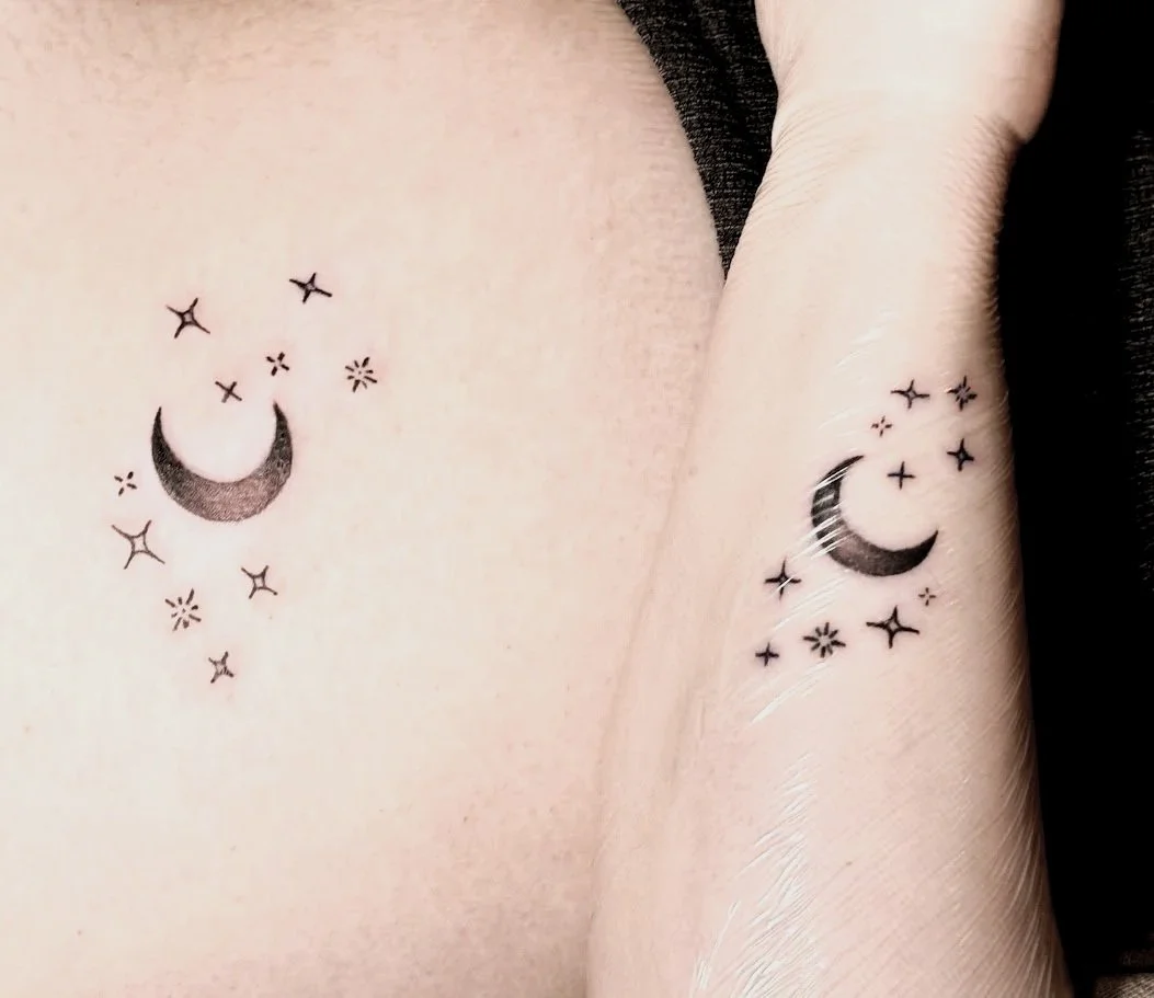Matching crescent moon and stars tattoos by Alicia Maye. Delicate fine line, Inklinations Cashmere WA.