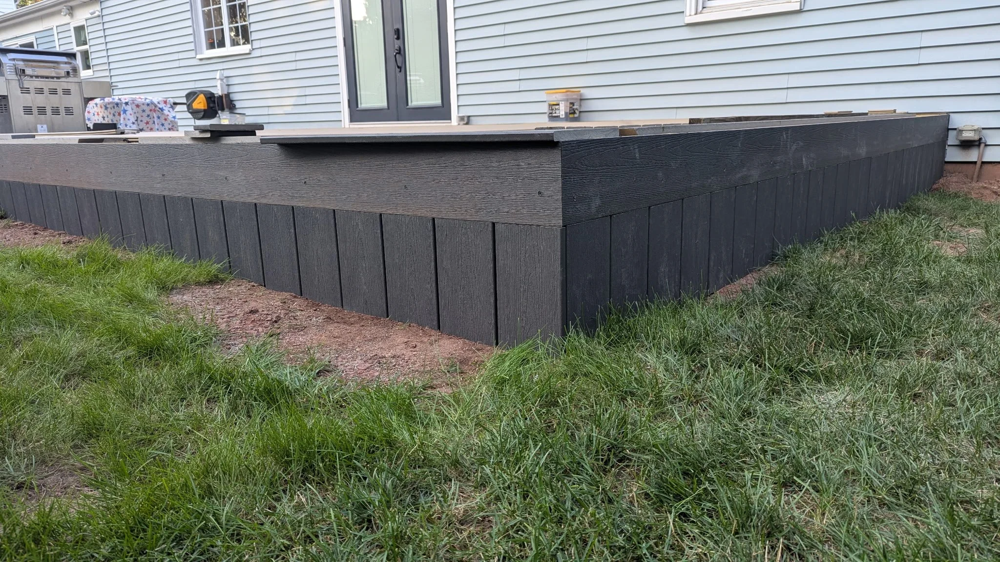 Close-up of striking board deck skirting