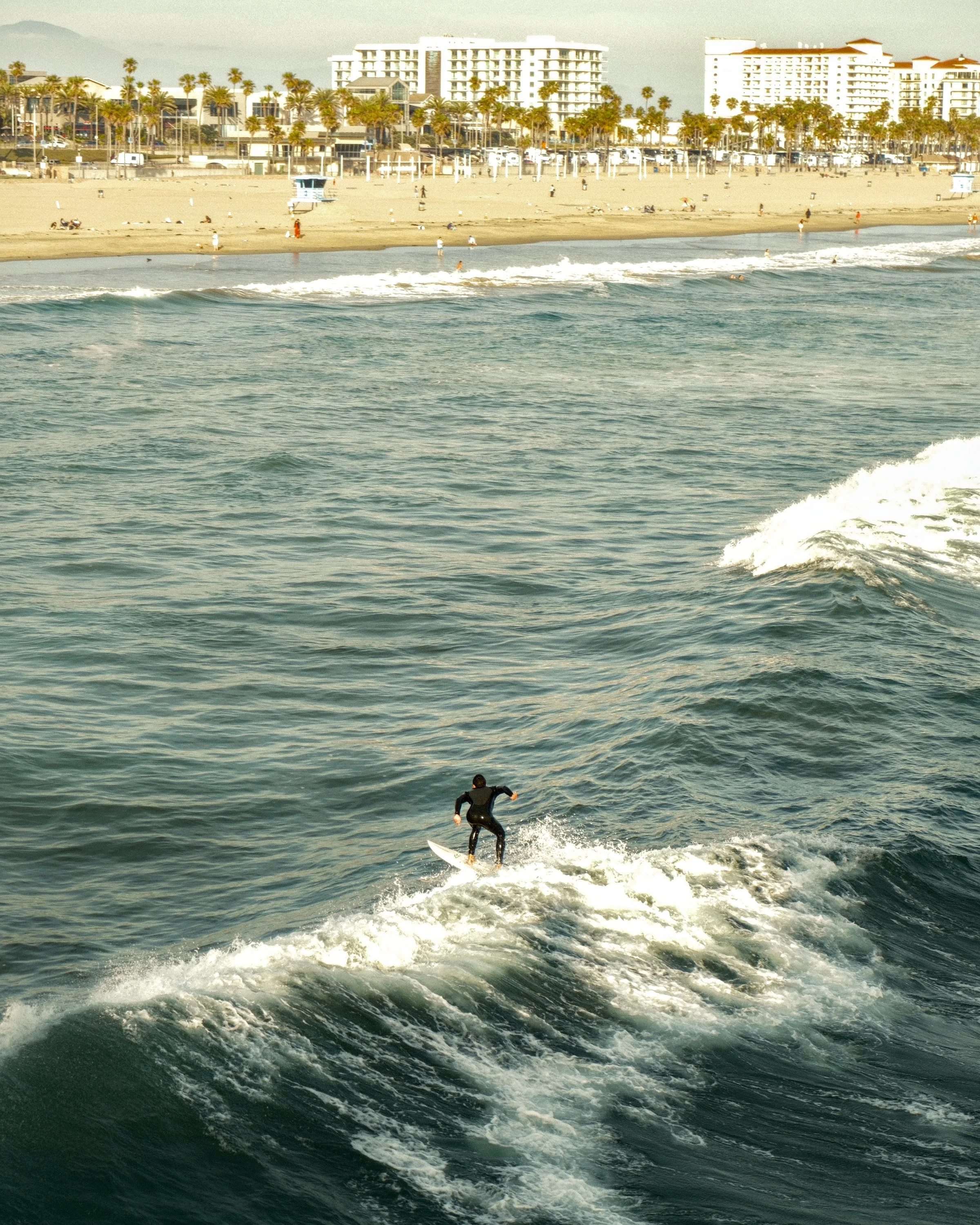 Surfer heading to shore.jpg