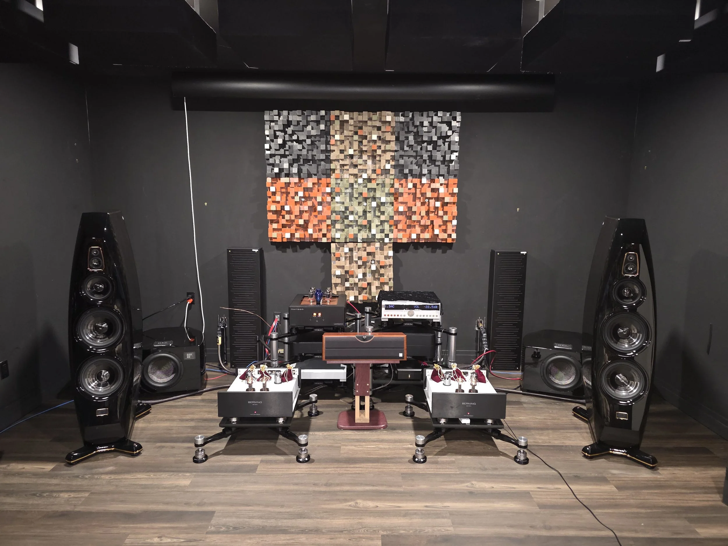 Berning ​Hi Fi One 211/845​ v3.0 OTL  amps​, Taiko Olympus with I/O, LampizatOr Horizon 360 dac, Boulder 2110 pre​amp, ​a ​full loom of Siltech Master Crown cables, Hifi Stay racks, Kharma Enigma Veyron 4d speakers, optimized by Stirling Trayle. 