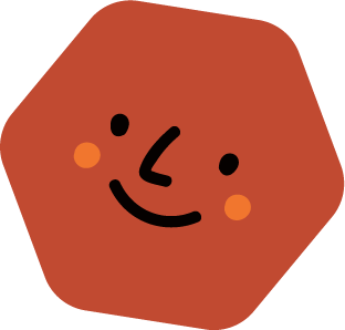 A cute brown octagon with a smiling face and rosy cheeks.