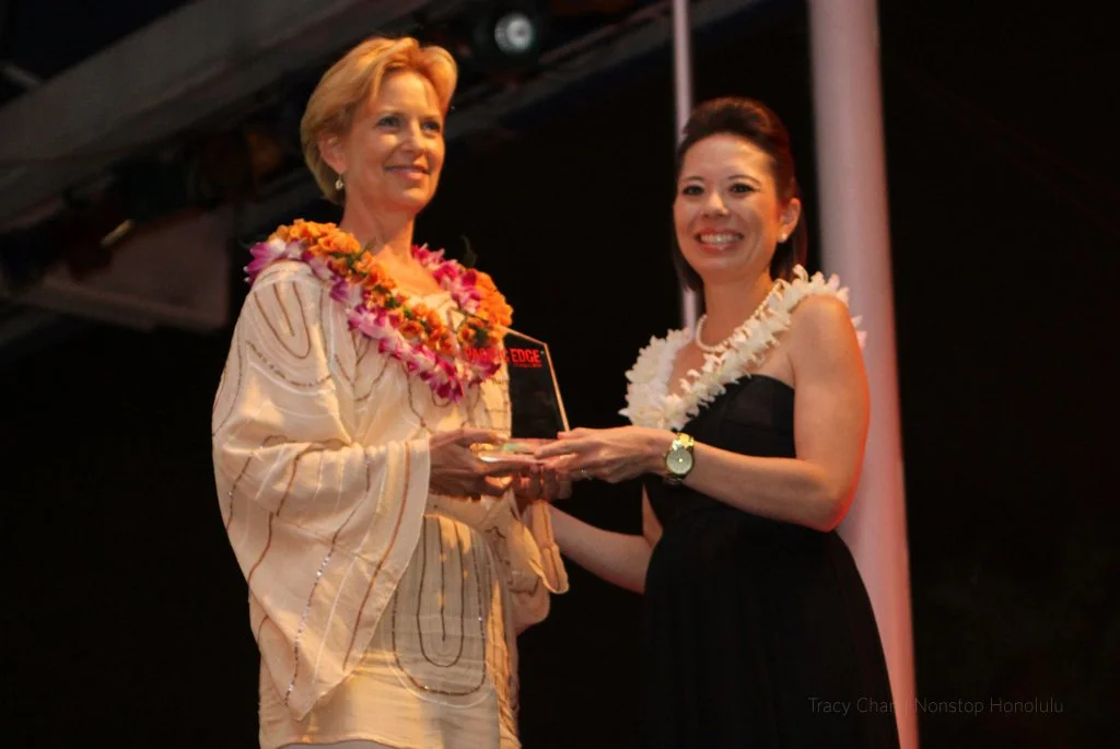 Photo of Roxanne Darling winning the Hawaii statewide award for best marketing program in 2011