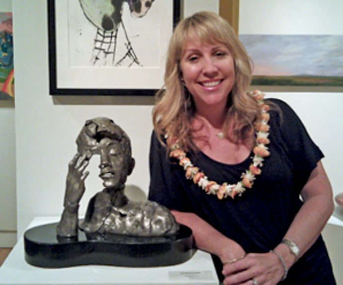 photo of maui artist christine turnbull with her award-winning sculpture