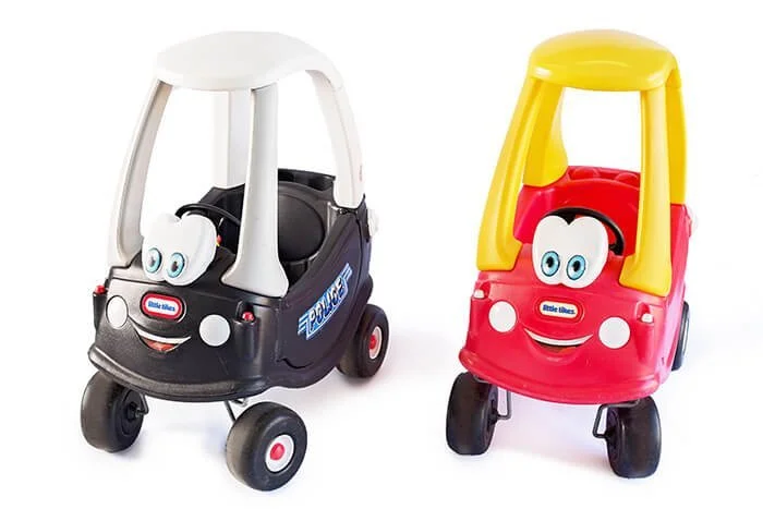 Little Tikes Cozy Coupe toy cars, designed for children to ride. Toddler toys play ball pit hire Perth