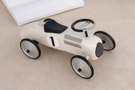 Children's white toy carWhite cream hop play Toddler toys play hire Perth