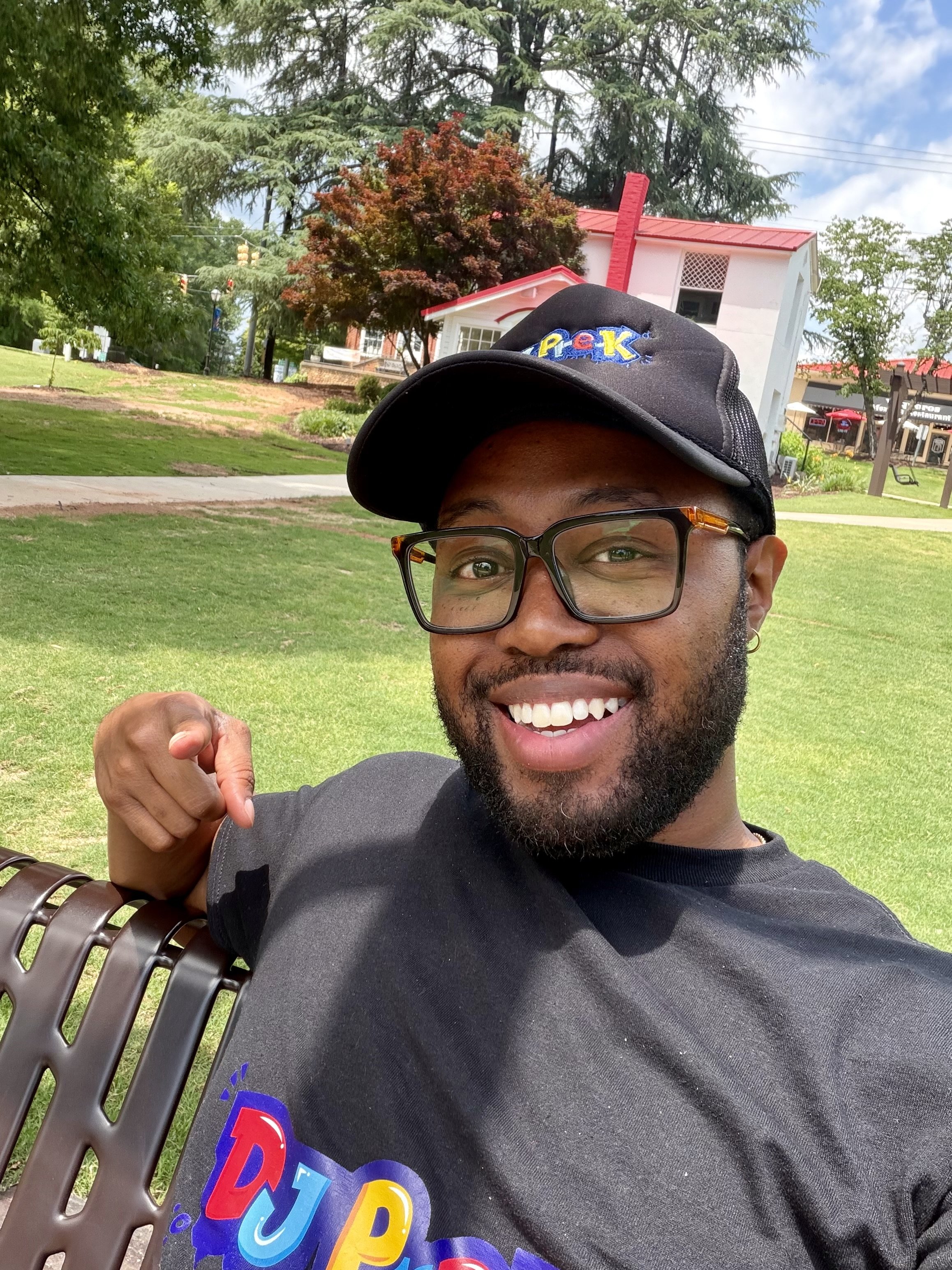 DJ Pre-K relaxes outdoors between community events and performances.