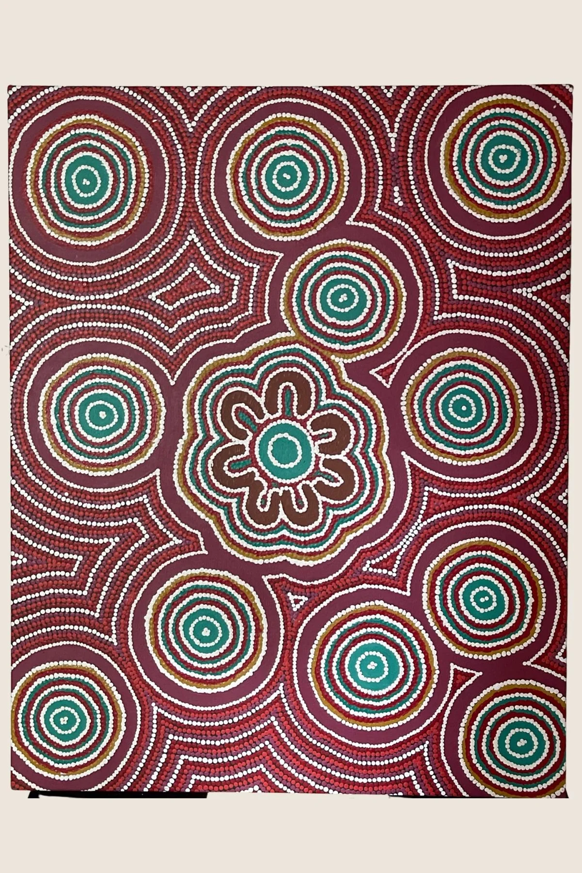 Aboriginal dot painting in maroon and teal, stretched canvas