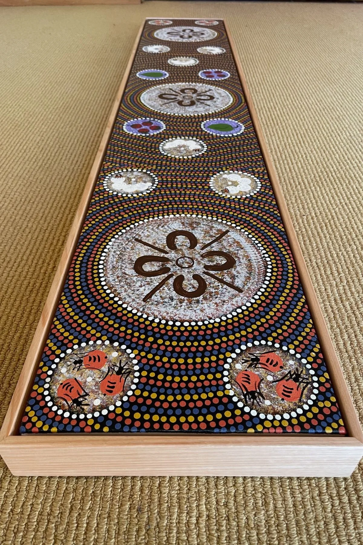 Aboriginal dot painting in a beeswaxed Tasmanian oak float frame