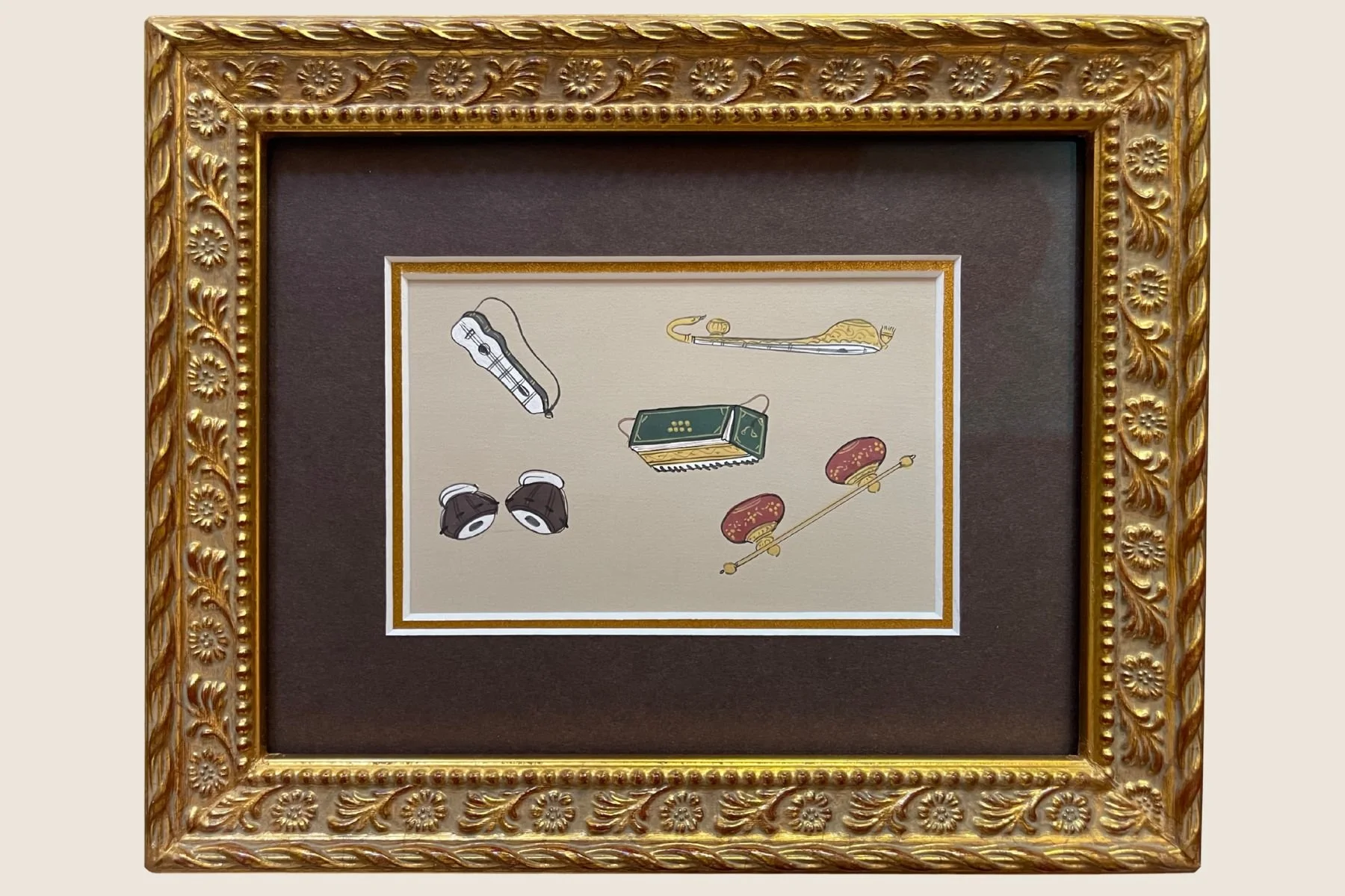 Musical instruments print in an ornate gold frame, double mat