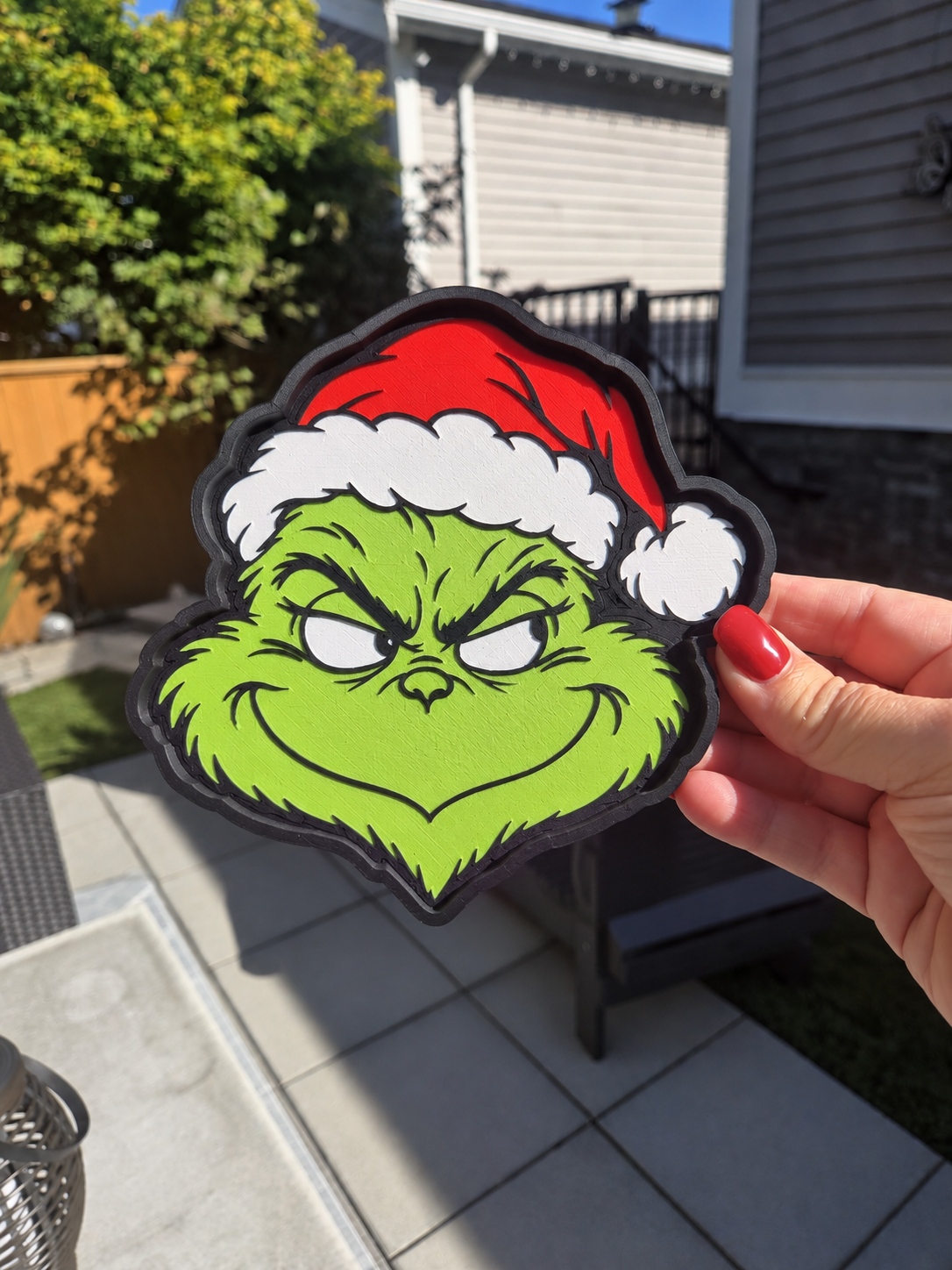 Lime-green holiday face trinket tray.png