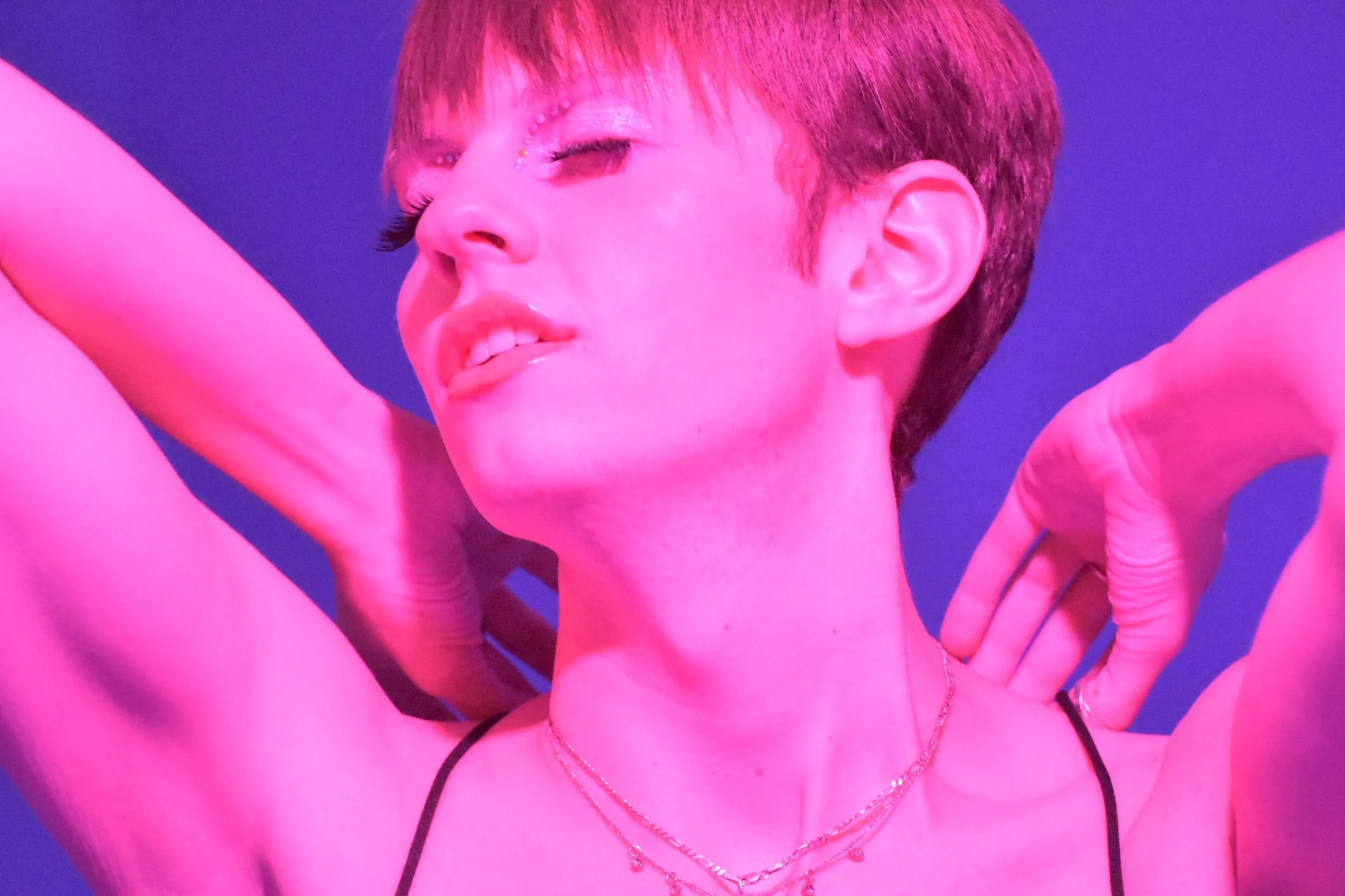 Shot for CORE Magazine at Tulane University, this editorial explores identity, vulnerability, and the contrast between nightlife culture and sobriety through saturated neon lighting and intimate portraiture.