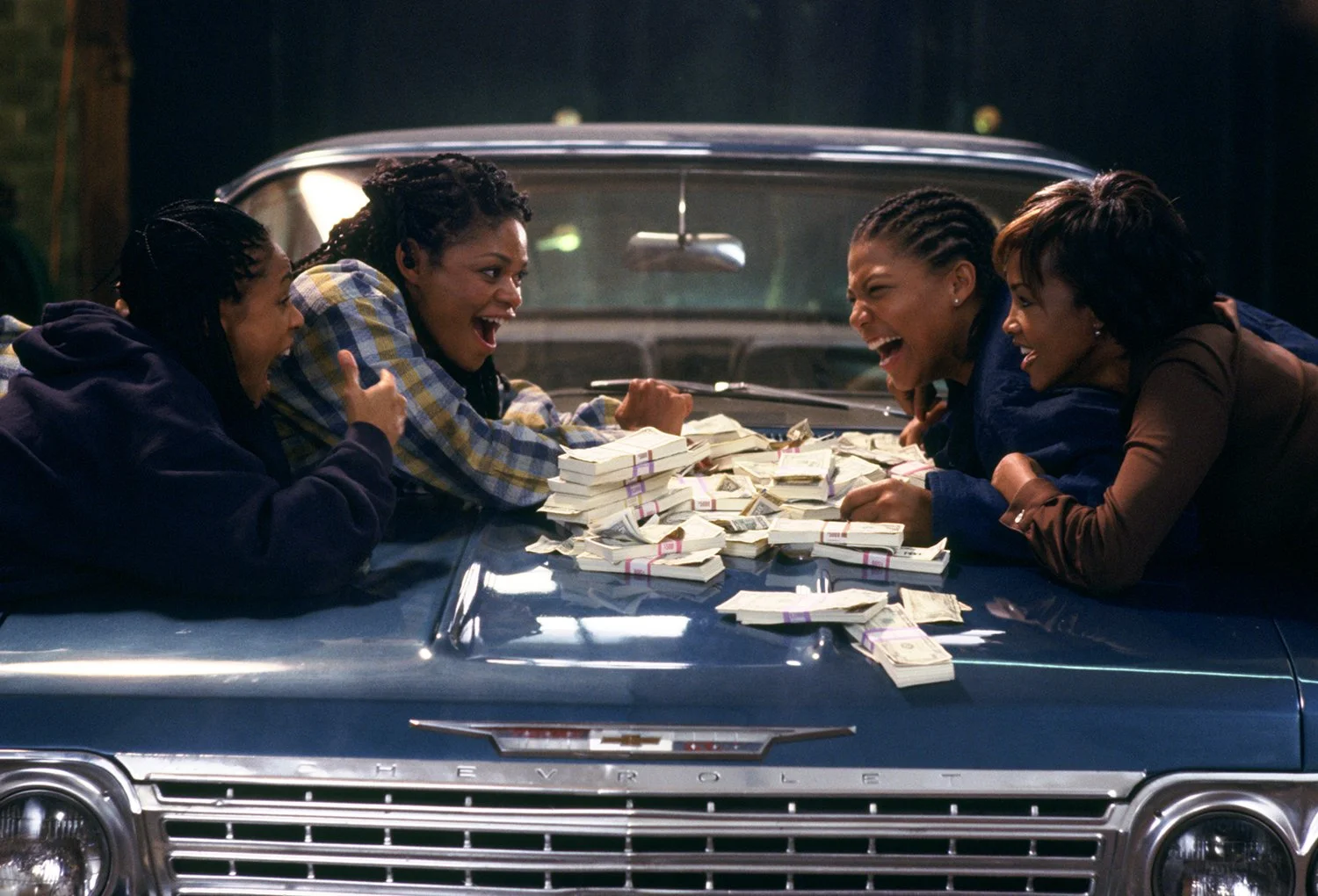 A scene from the movie "Set It Off" Featuring Vivica Fox, Queen Latifah, Jada Pinkett, and Kimberly Elise.
