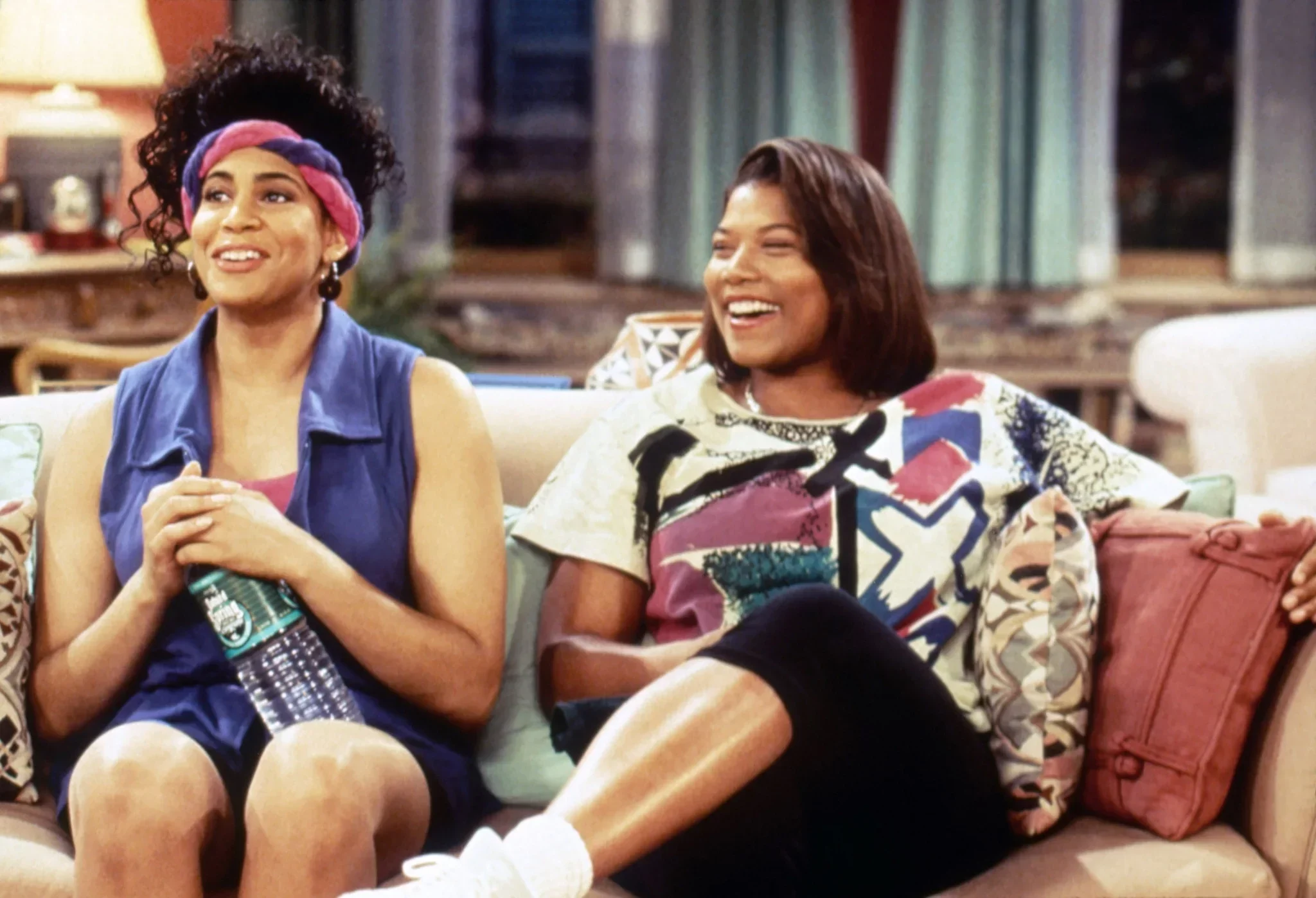 A scene featuring Queen Latifah and Kim Coles from the 90s sitcom "Living Single"