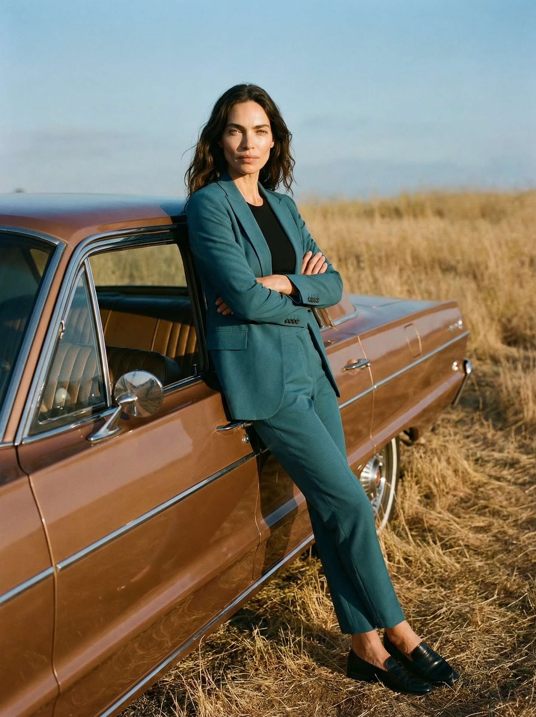 Atelier_Goldner_A_woman_leans_against_a_vintage_car_in_a_golden_AdKiXNJY(1).png