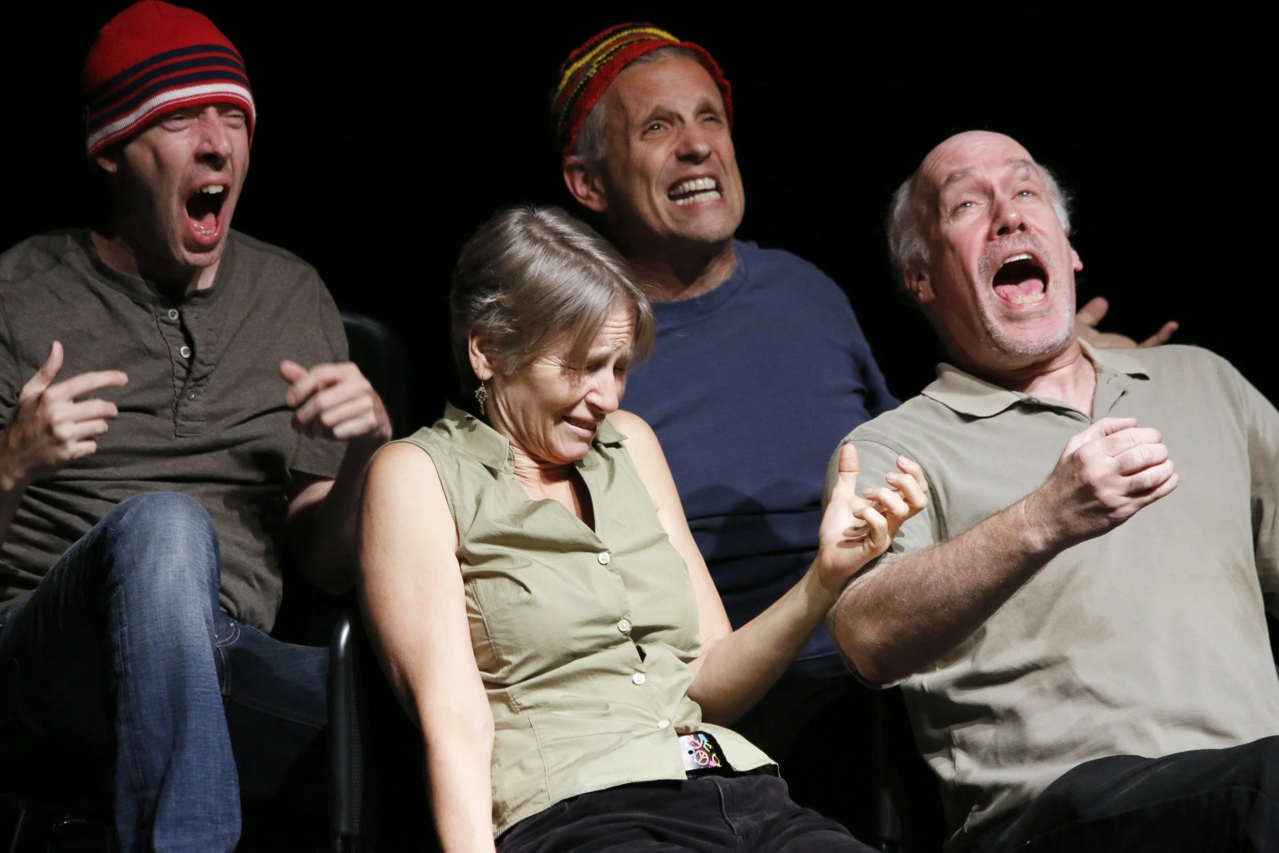 Precipice Improv Theater performing an improvised comic play on stage in Bethesda, MD.