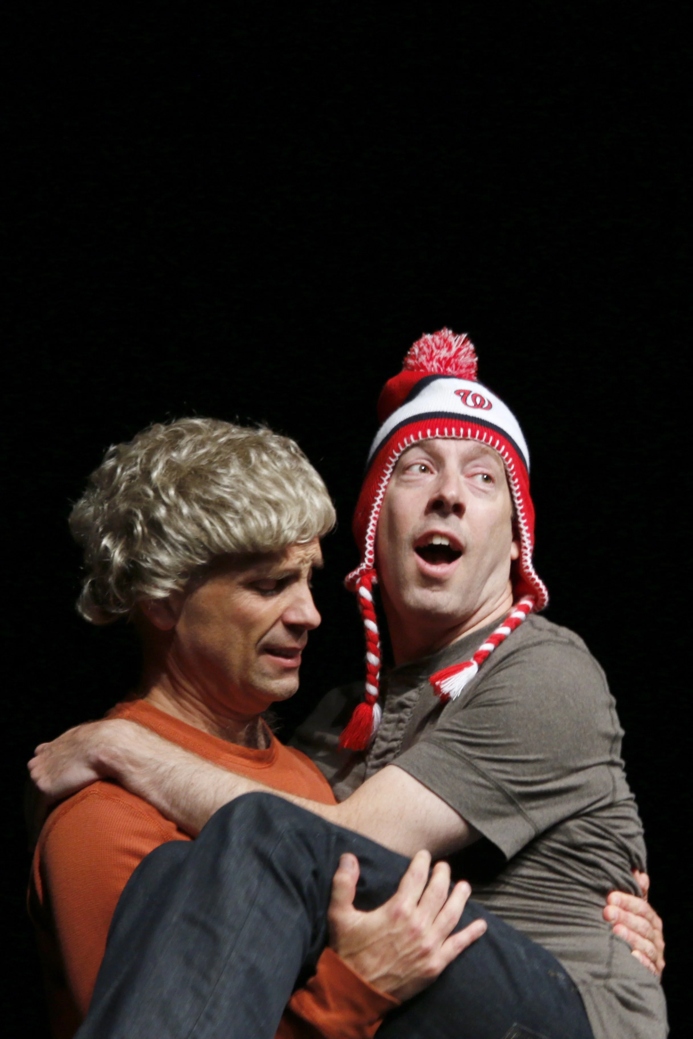 Precipice Improv Theater performers in a comic scene from an improvised play in Bethesda, MD.