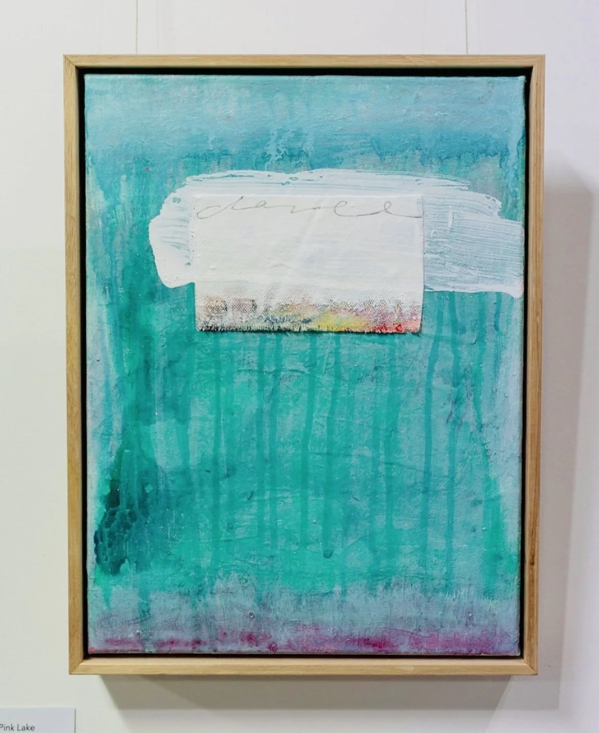 Abstract painting with a turquoise background, white and pastel accents, and the word 'March' written faintly in the center.