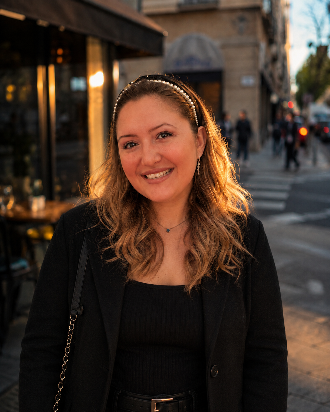 Registered Dietitian and media nutrition expert Laney Miller smiling on city street at sunset.