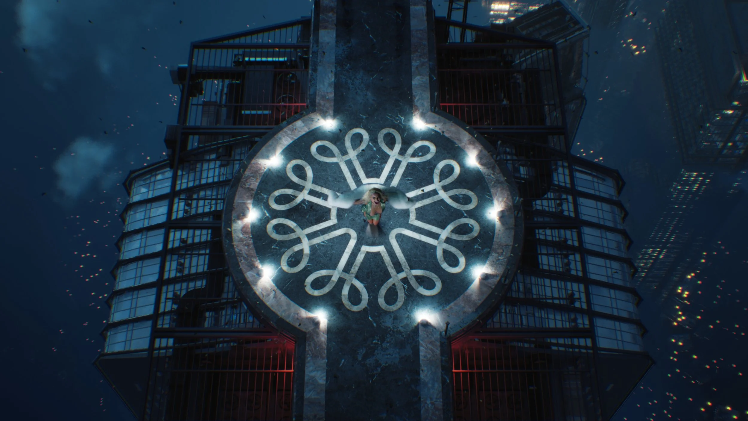 A woman standing on top of a lit circular pattern on a rooftop at night, with a city skyline and buildings in the background.