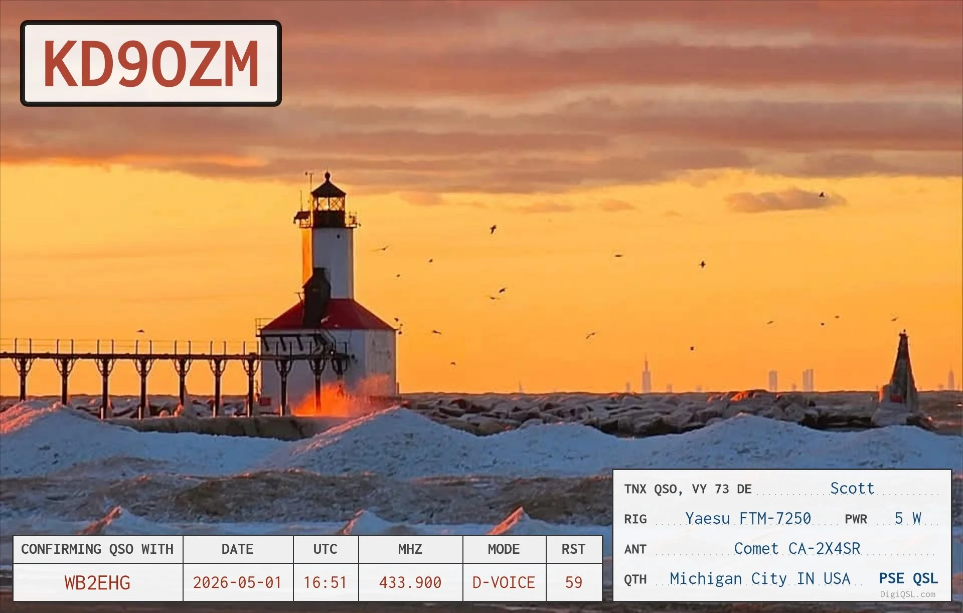 QSL card from Scott, KD9OZM, in Michigan City, Indiana, confirming a digital voice contact with WB2EHG on May 1, 2026. The card features a lighthouse beside a snowy shoreline beneath a glowing orange sunset.