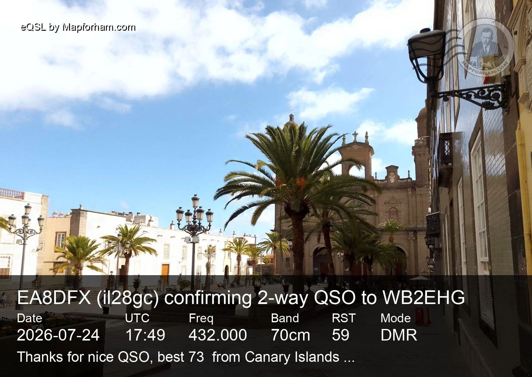QSL card from EA8DFX in the Canary Islands, featuring a sunny plaza with palm trees and historic architecture.