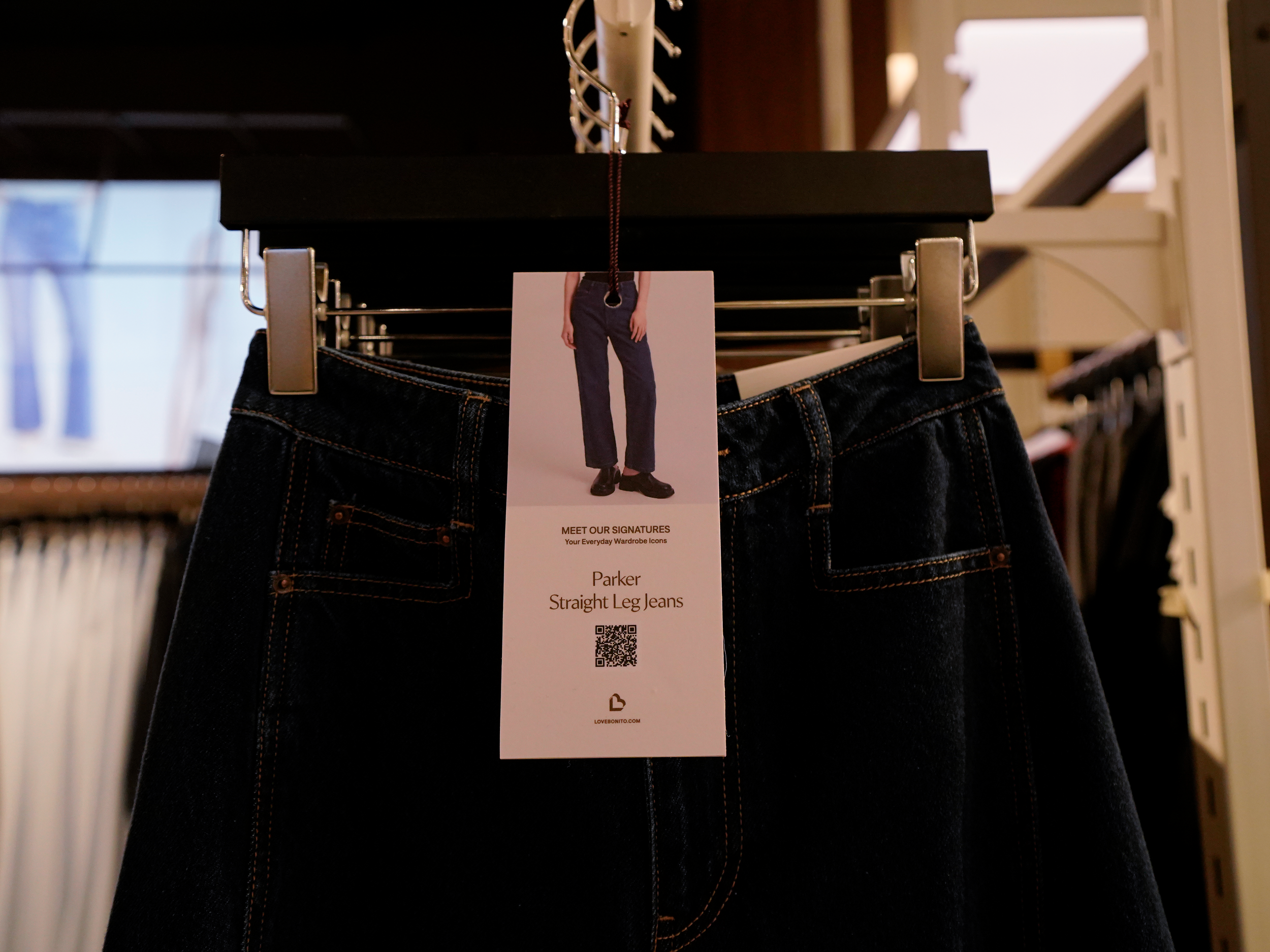 Love Bonito hanger tags sticker printed on sintra of denim pants showing product item