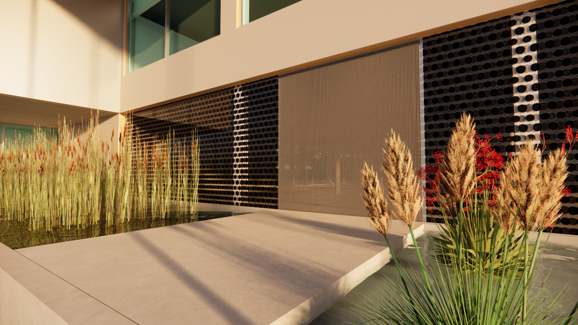 Modern building exterior with decorative wall panels, a reflecting water feature, and tall grass plants in the foreground.