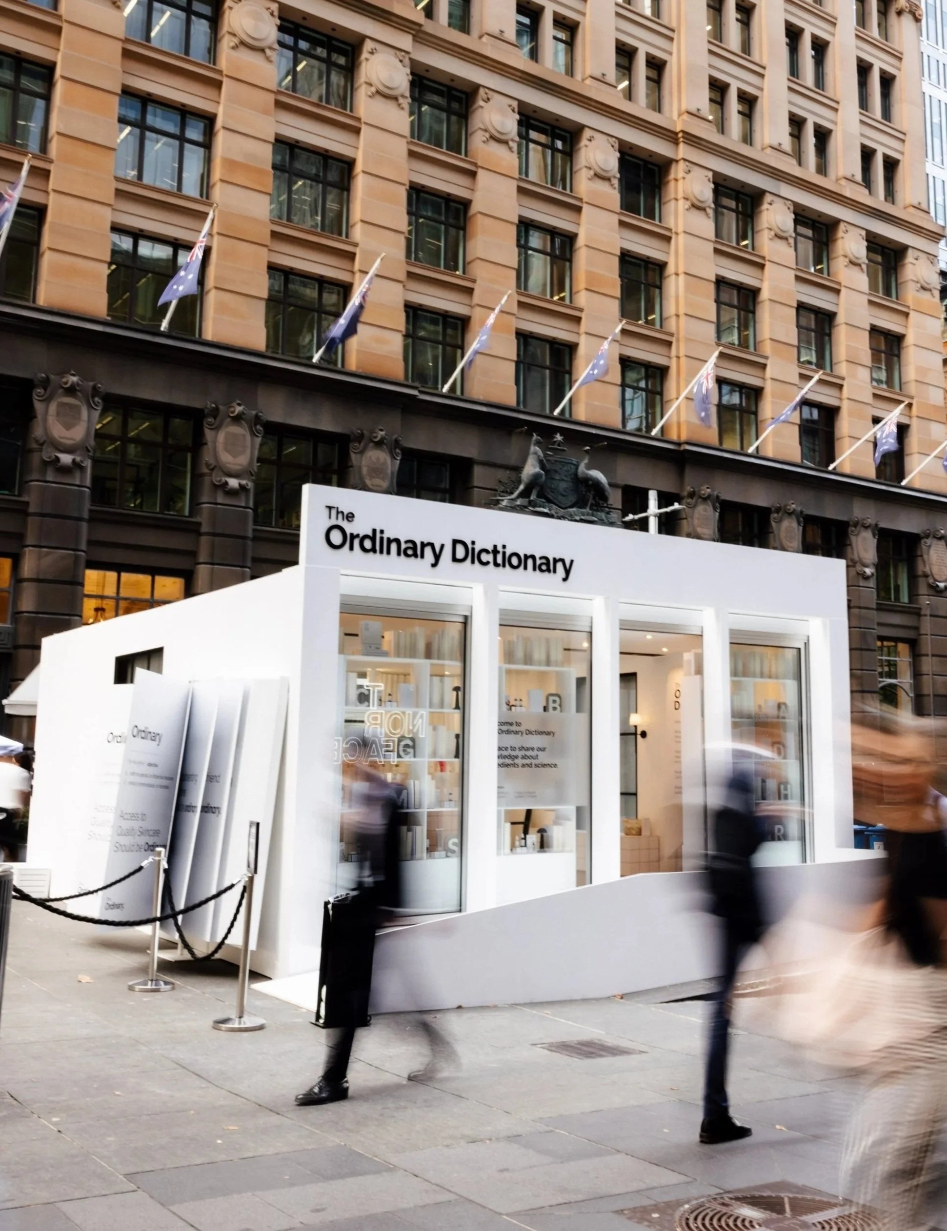 brand activation signage for pop up shop in martin place, sydney. acrylic lettering, window vinyl, frosted vinyl, window tint and wall decals.