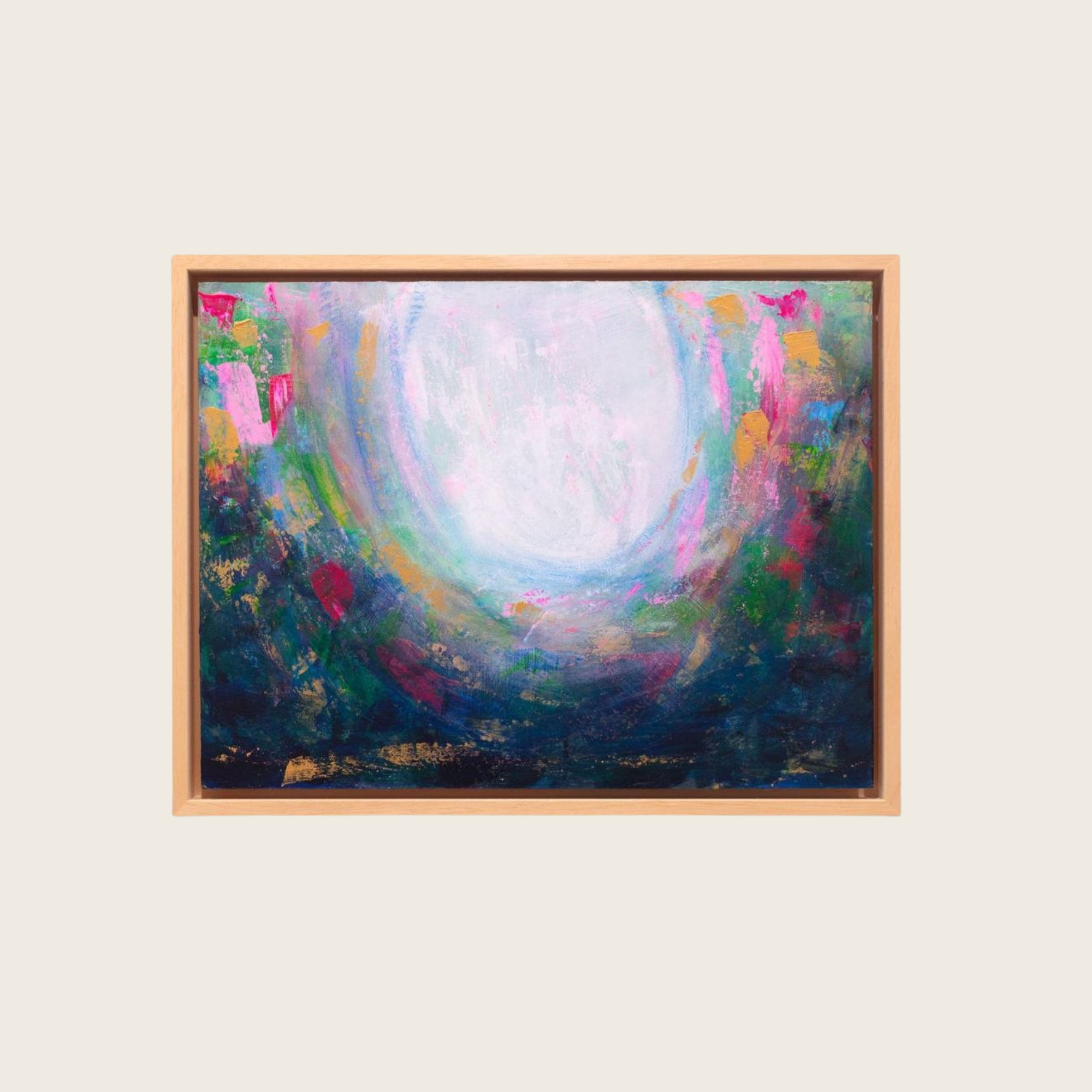 Colorful abstract painting with vibrant pink, purple, green, yellow, and bluebrushstrokes, framed in wood, on a plain white background.