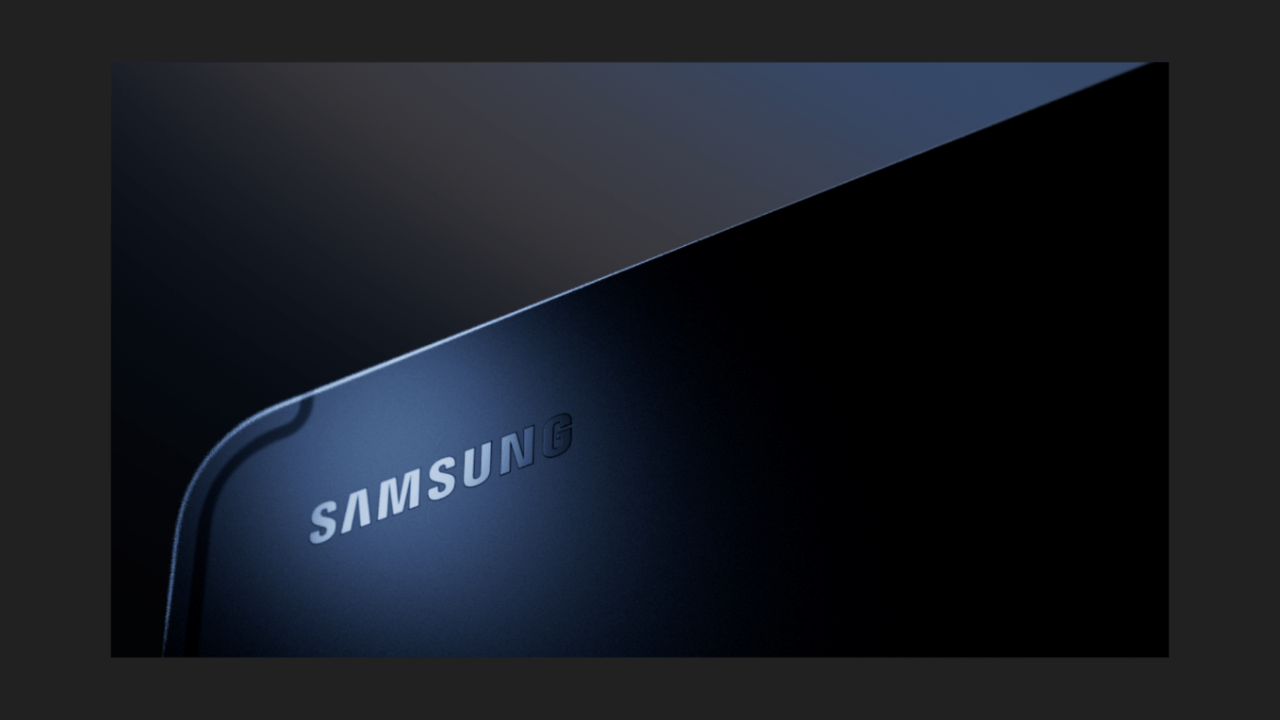 Close-up of the corner of a dark Samsung electronic device with the logo visible.